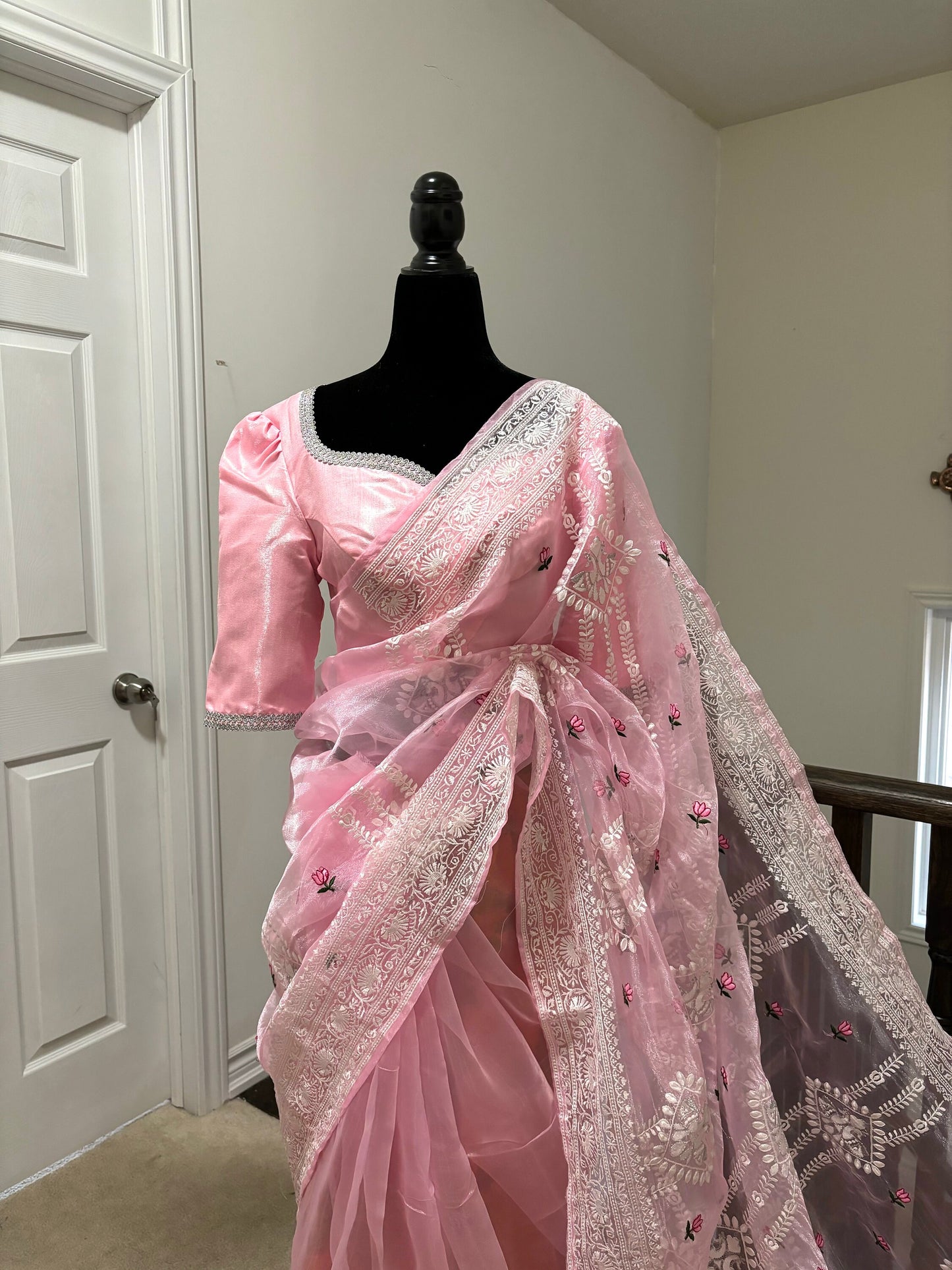 Banarasi organza saree with beautiful chiken Kari all over the saree. Saree is ready with beautiful designer blouse that fit to 32-46 Ideal