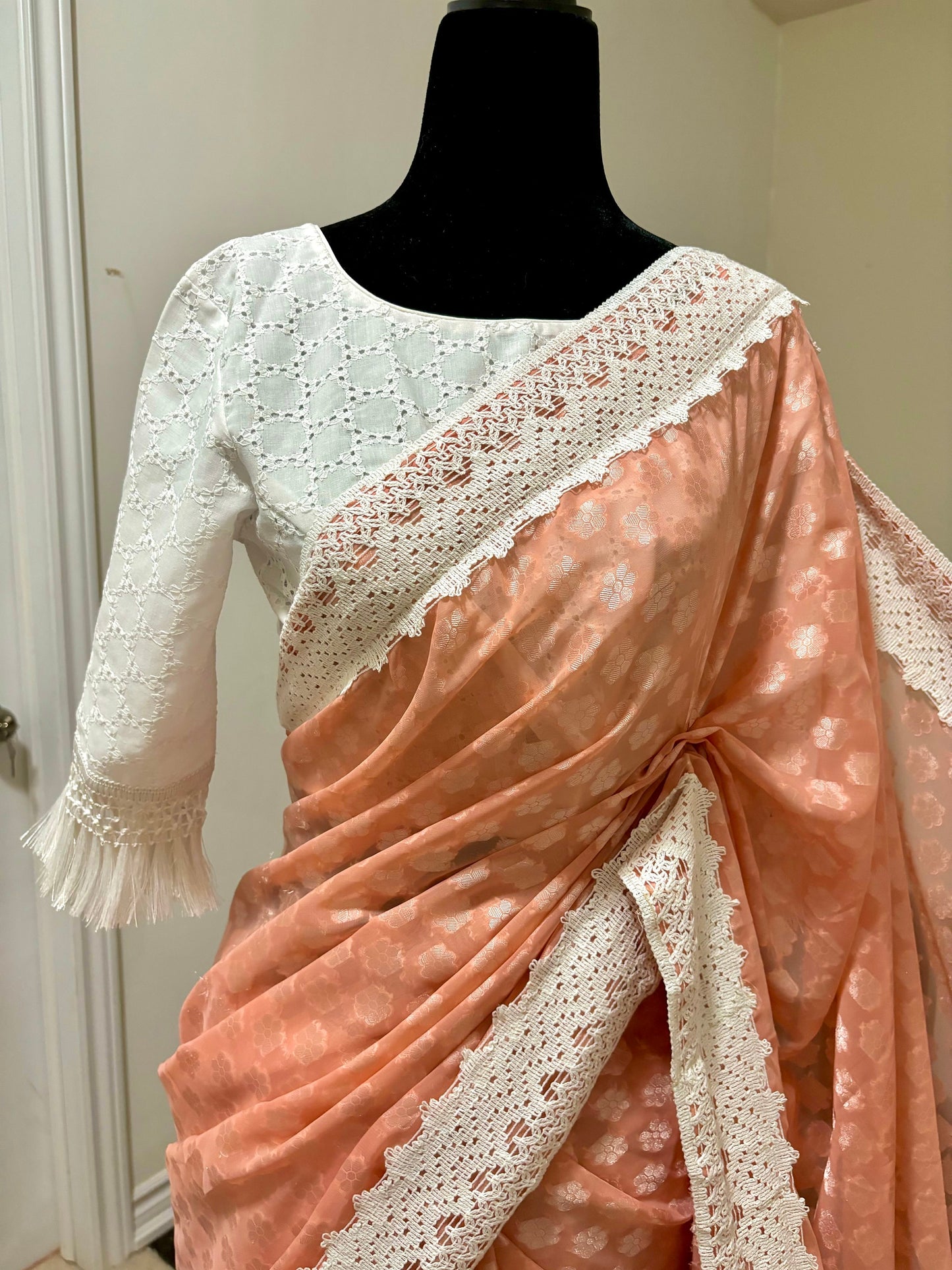 Beautiful soft falling georgette on sabyasachi lace borders unique eye cooling pestal shades. Ready to wear designer blouse fits 32-44