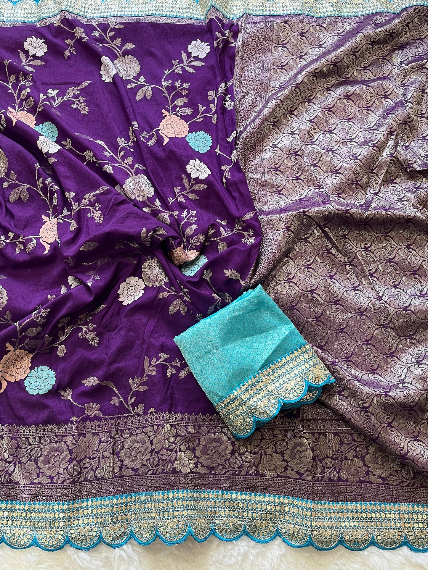 Pure banarasi kattan Pattu saree with flower weaving on all over thesareeweaving border on either sideRich & elegant weaving pallu as shown