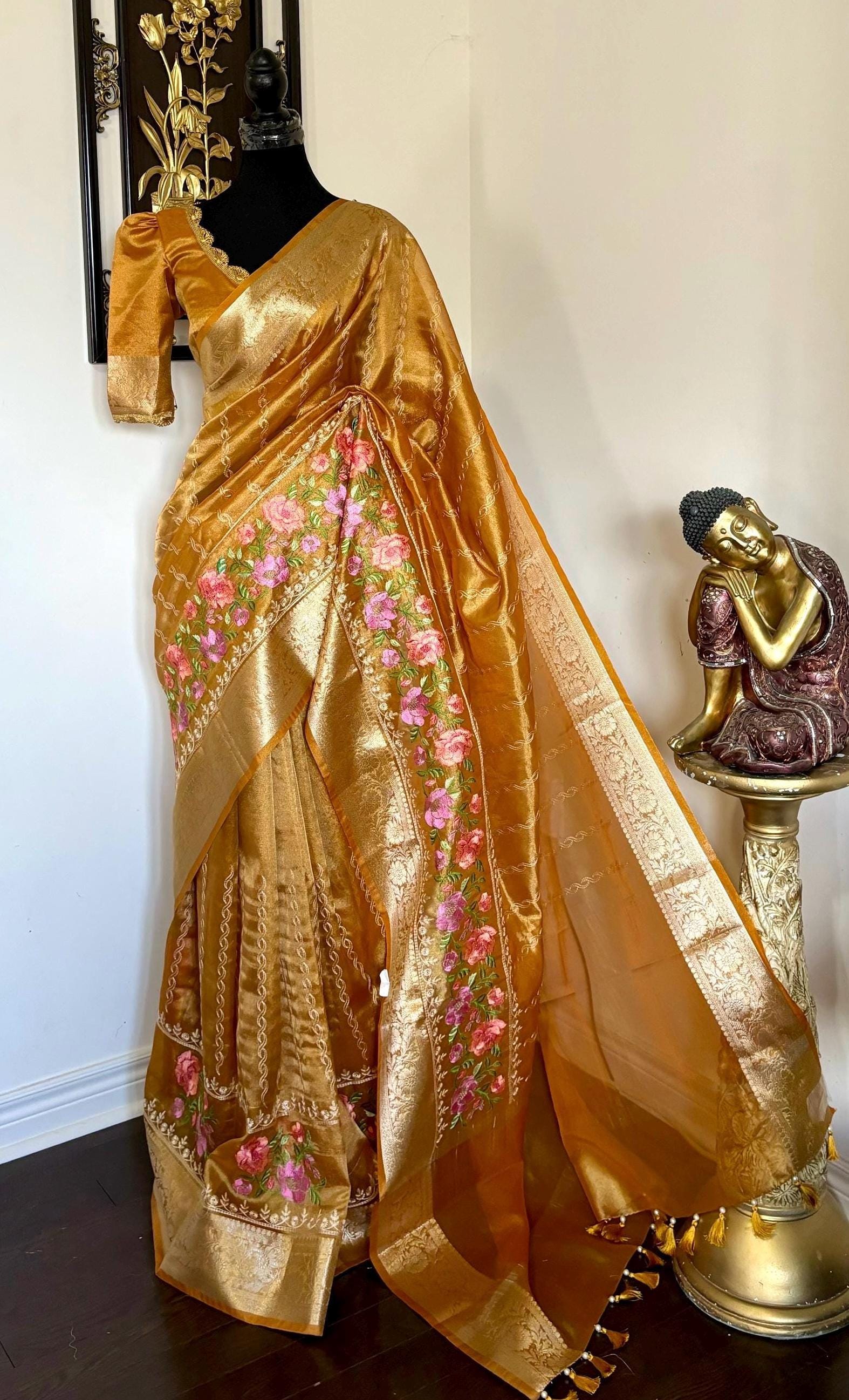 Banarasi  tissue saree with self weaving with beautifully embroidered boarder all over the saree in Golden shade rich weaving ready Blouse