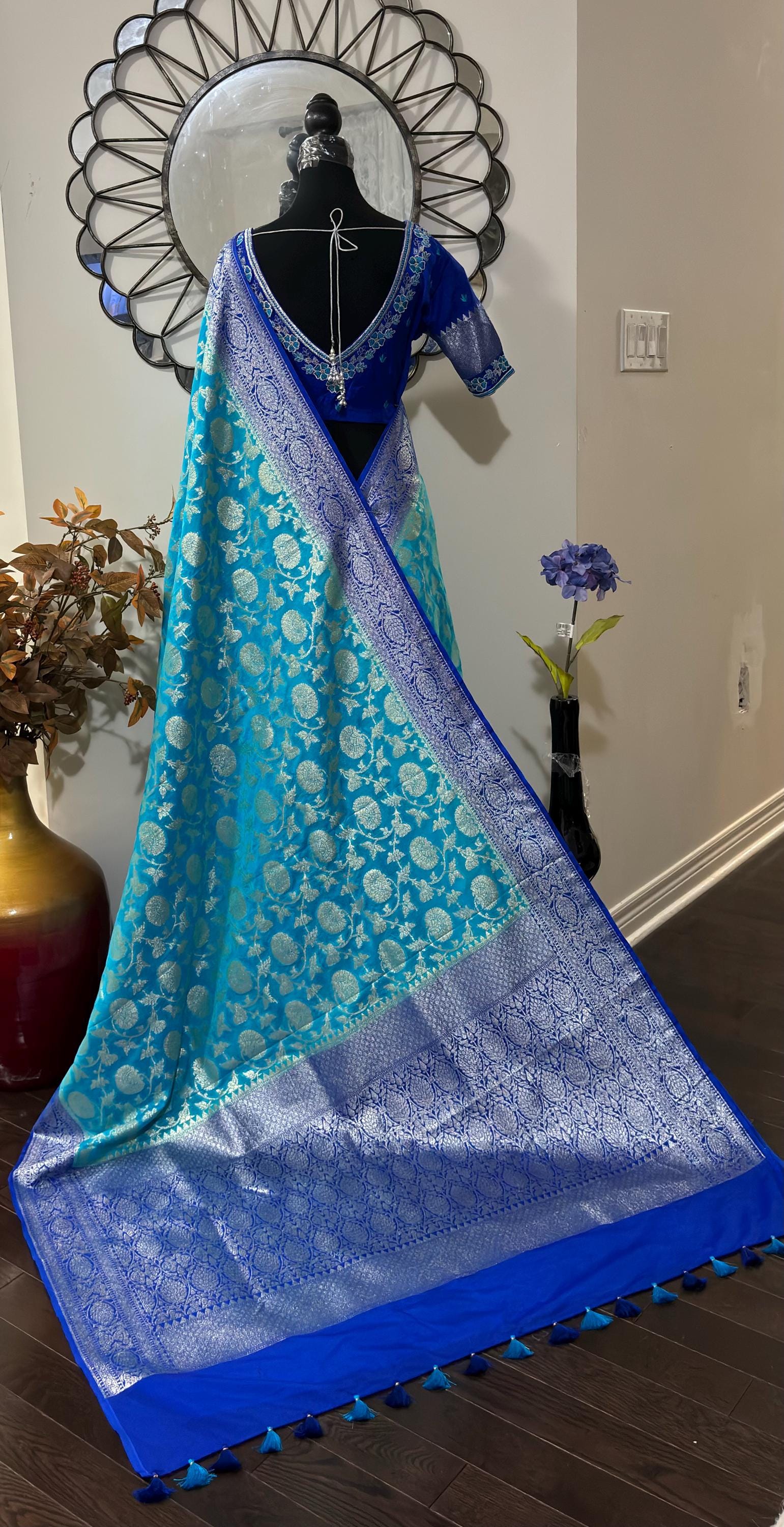 Beautiful banarasi silk saree paired up with beautiful embroidery blouse fits to 32 to 46 in beautiful rare colors all over jaal. Cocktails