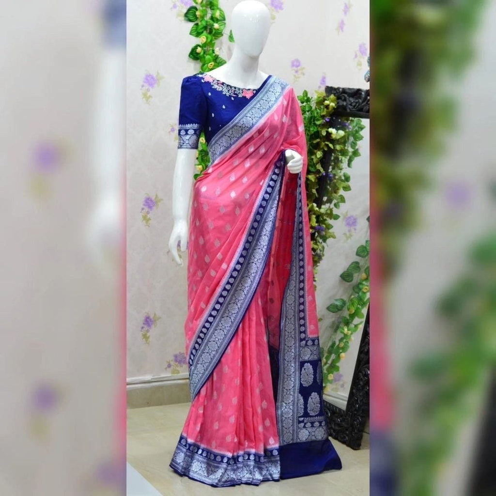 Beautiful banarasi kattan saree paired up with pretty maggam work blouse.