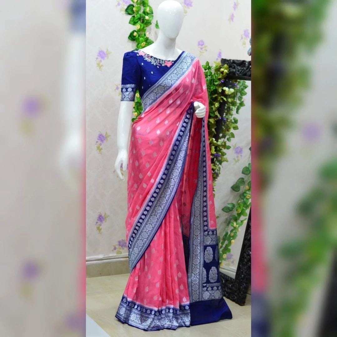 Beautiful banarasi kattan saree paired up with pretty maggam work blouse.