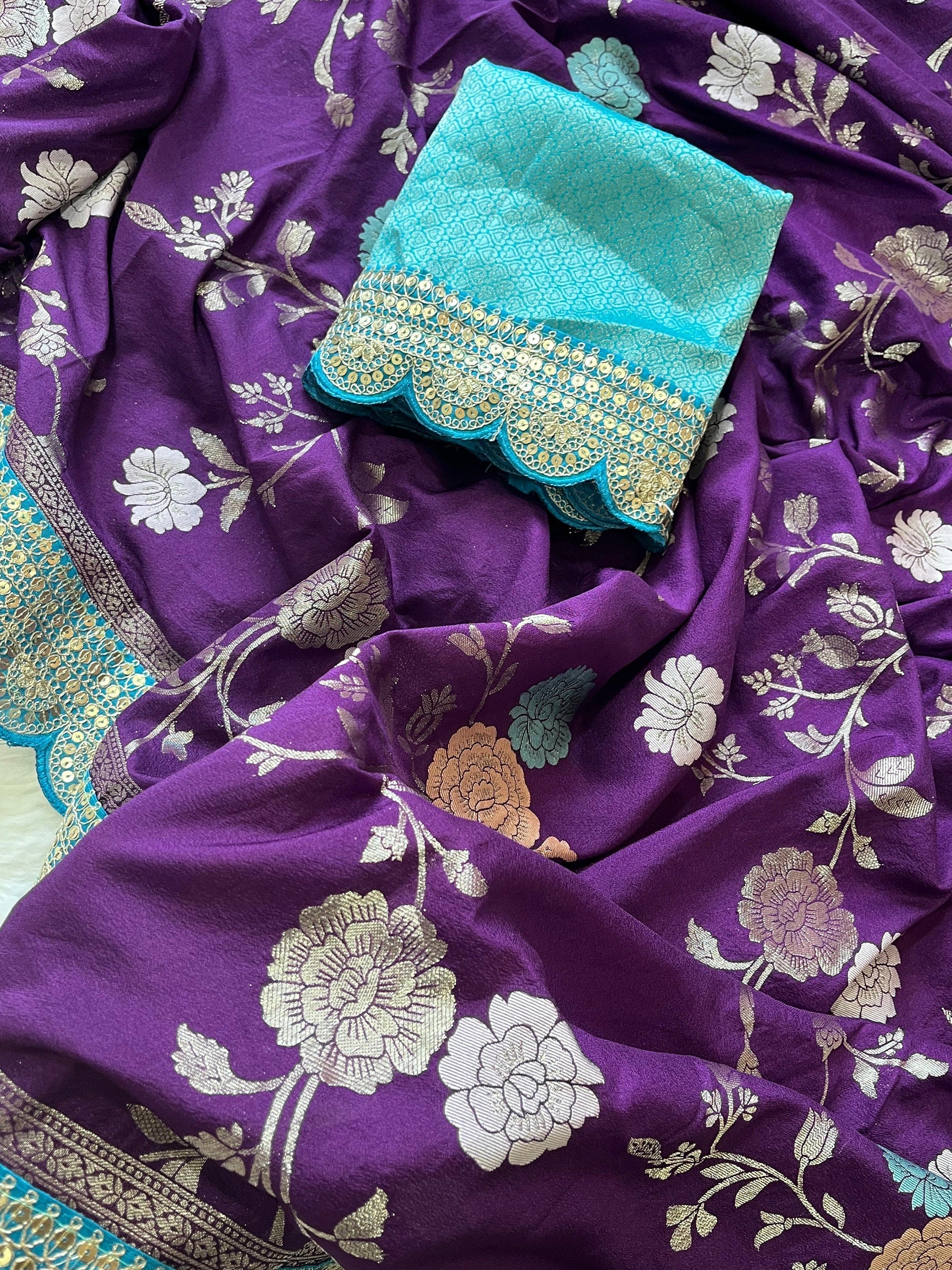 Pure banarasi kattan Pattu saree with flower weaving on all over thesareeweaving border on either sideRich & elegant weaving pallu as shown