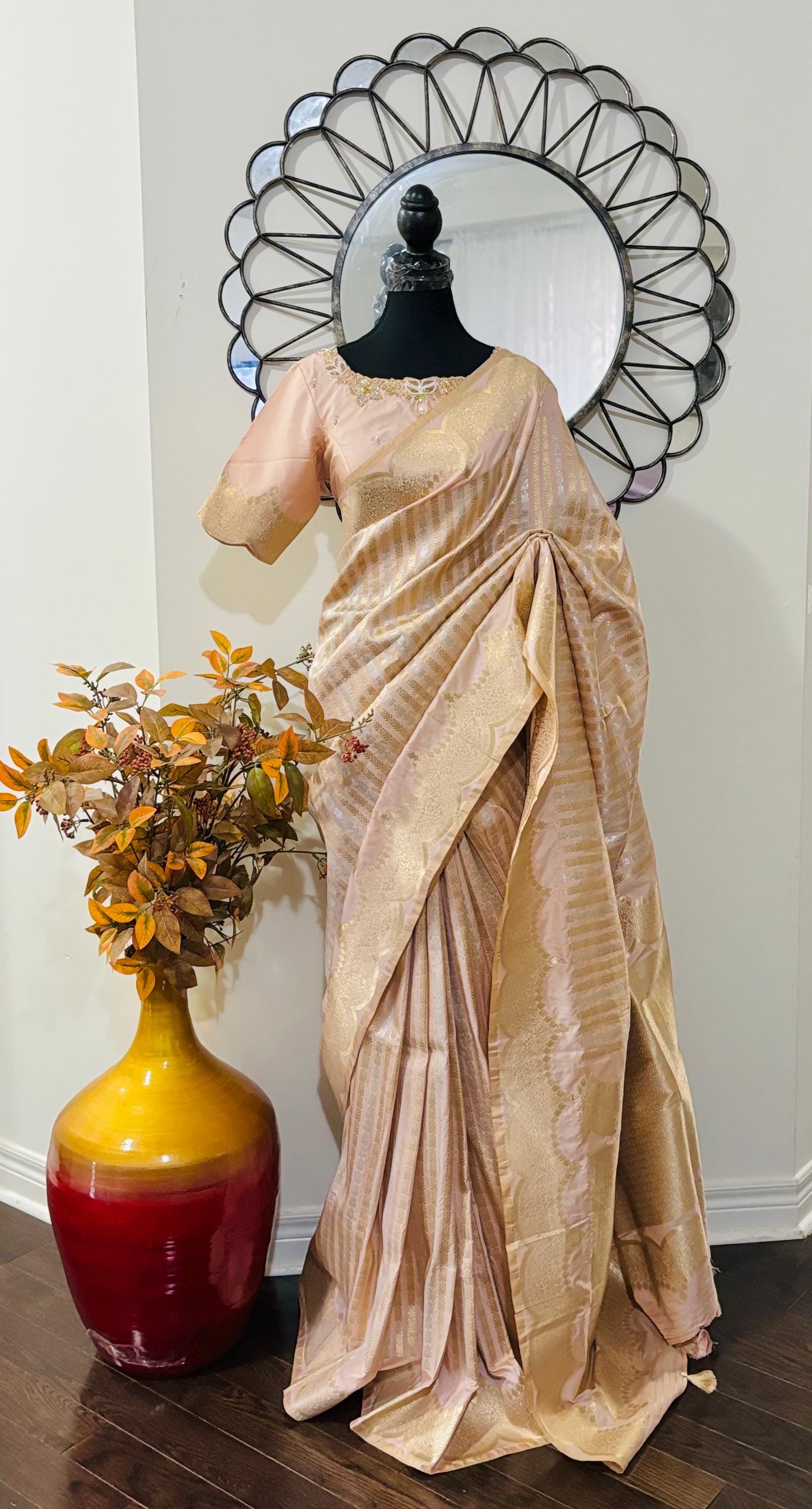Beautiful Banarasi kataan silk  saree paired up with pretty Maggam work blouse. Blouse sizes can be customized.