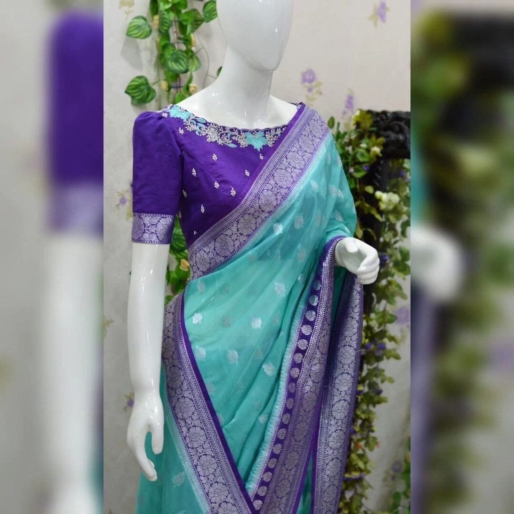 Beautiful banarasi saree paired up with pretty maggam work blouse.
