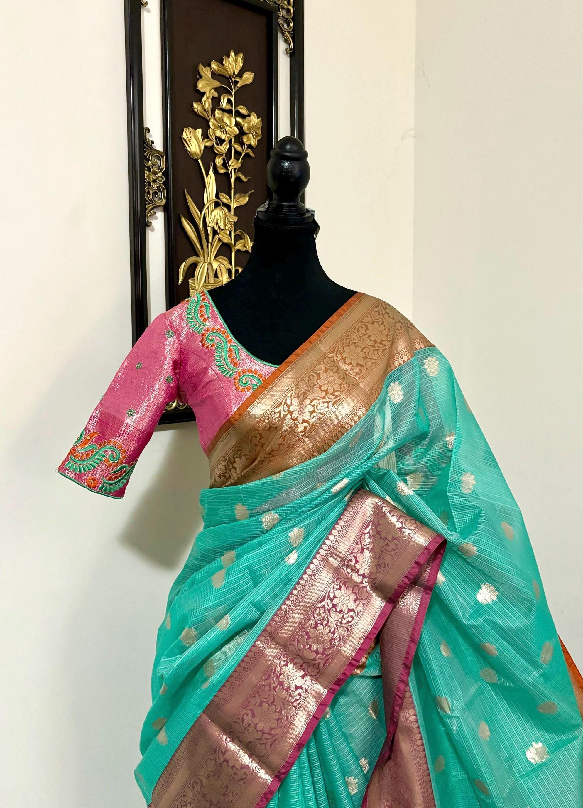 Beautiful Tissue Zari Kota saree with Kanchi  Zari boardes and beautifully done blouse paired up with pretty blouse fits up to 32 to 46