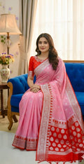Beautiful banarasi saree paired up with pretty maggam work blouse.
