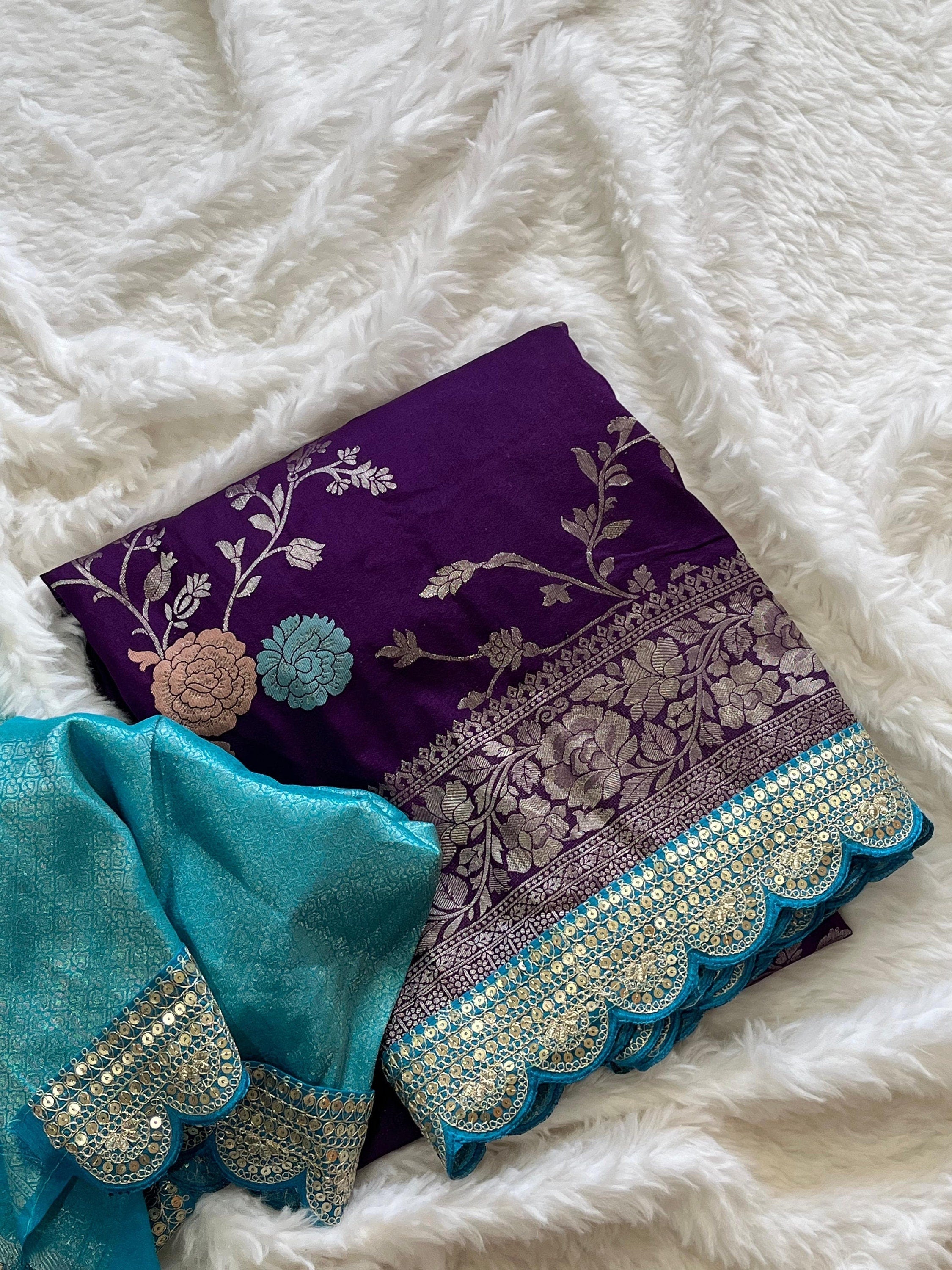 Pure banarasi kattan Pattu saree with flower weaving on all over thesareeweaving border on either sideRich & elegant weaving pallu as shown