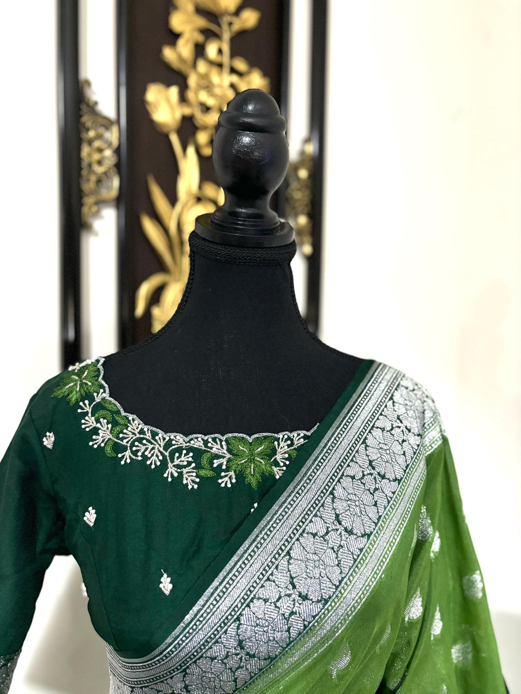 Beautiful banarasi saree paired up with pretty maggam work blouse.dits to 32-46
