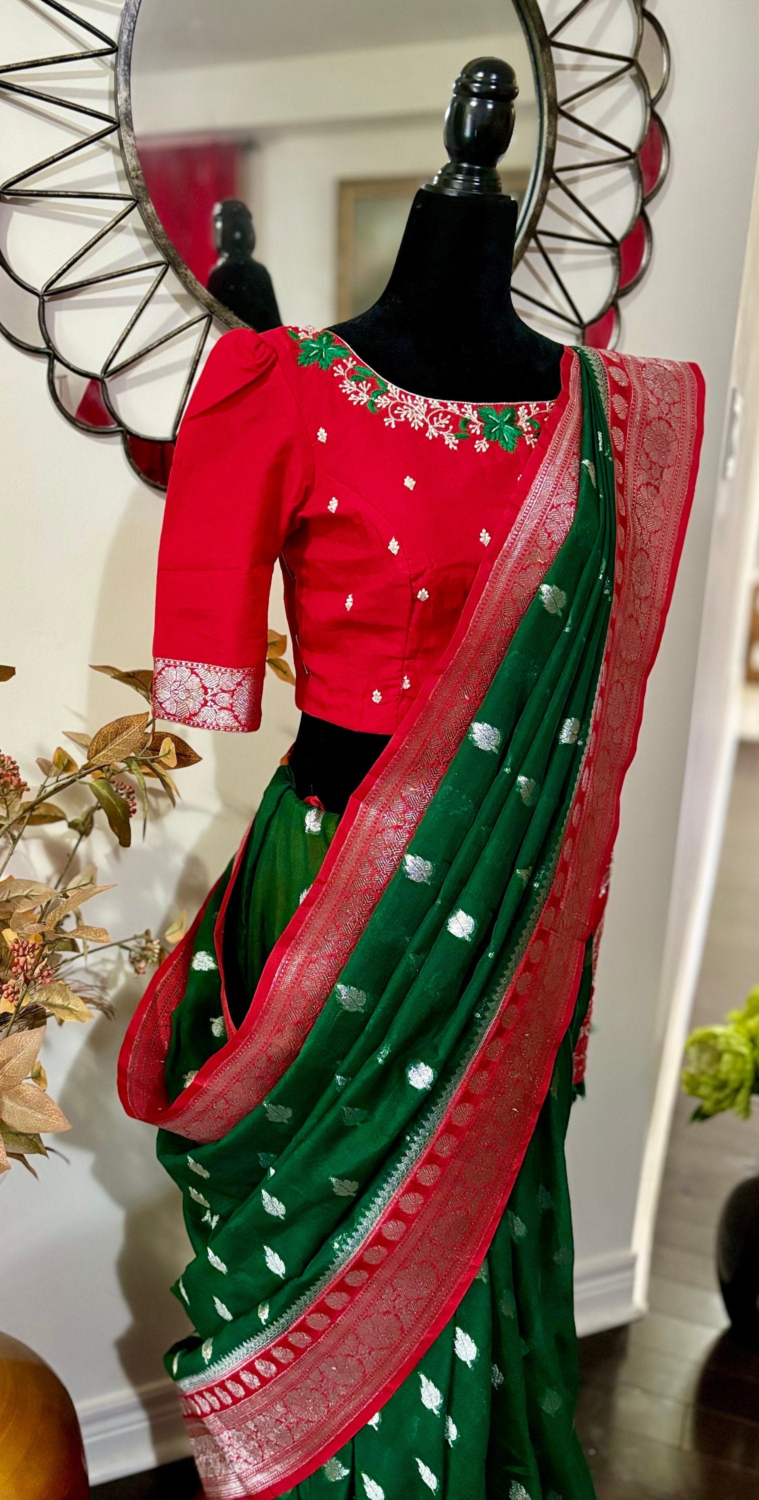 Beautiful banarasi kattan saree paired up with pretty maggam work blouse.