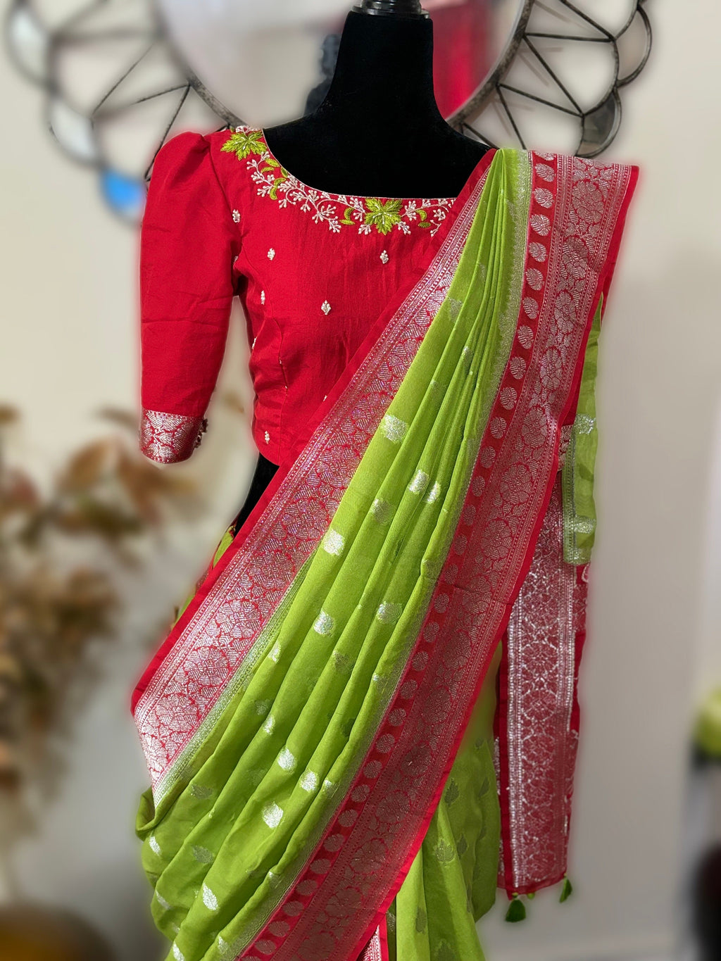 Beautiful banarasi saree paired up with pretty maggam work blouse.