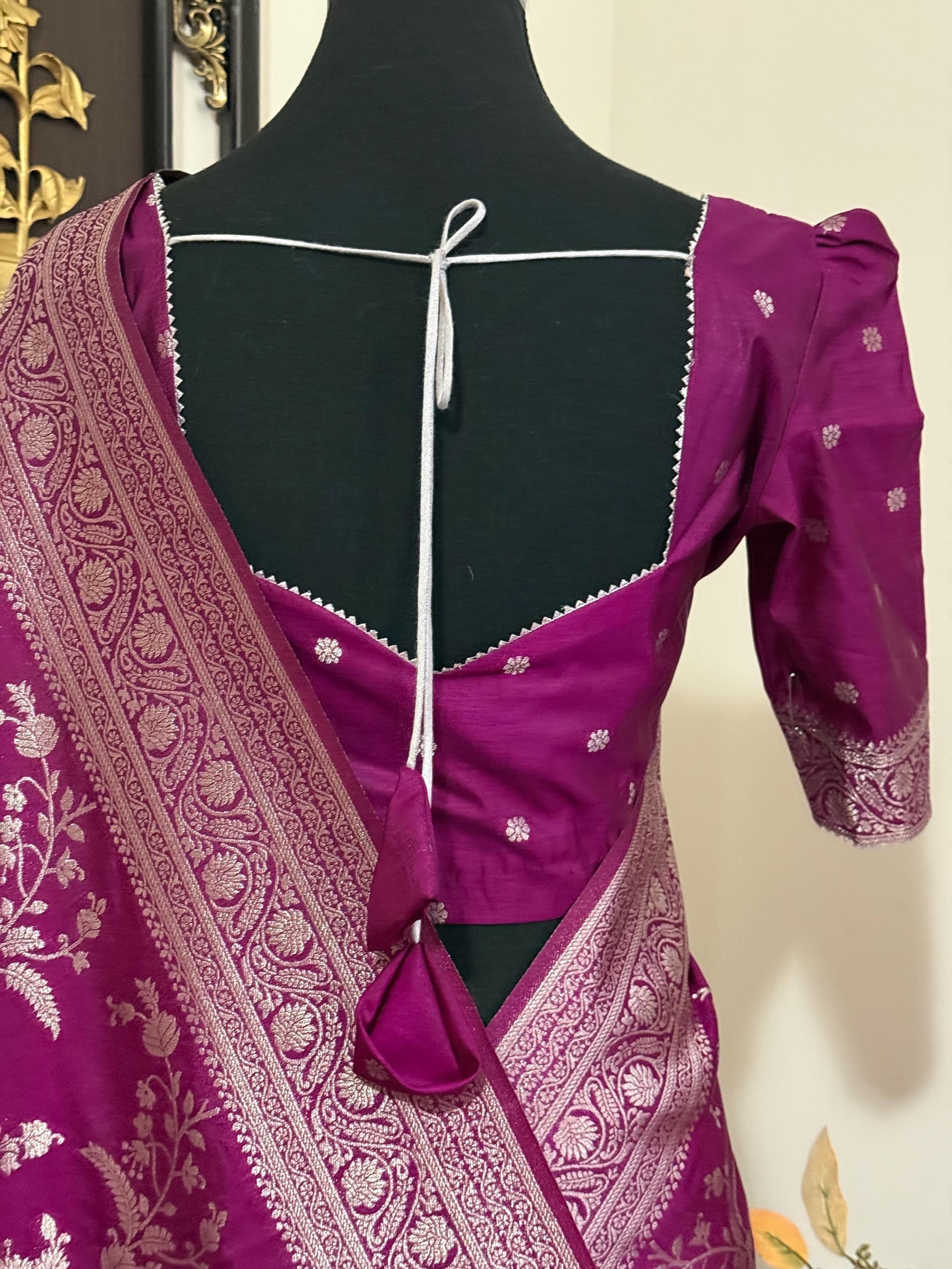 Beautiful banarasi saree with silver Zari weaving all over the saree paired up with pretty ready to wear  blouse that fits to 32 to 46
