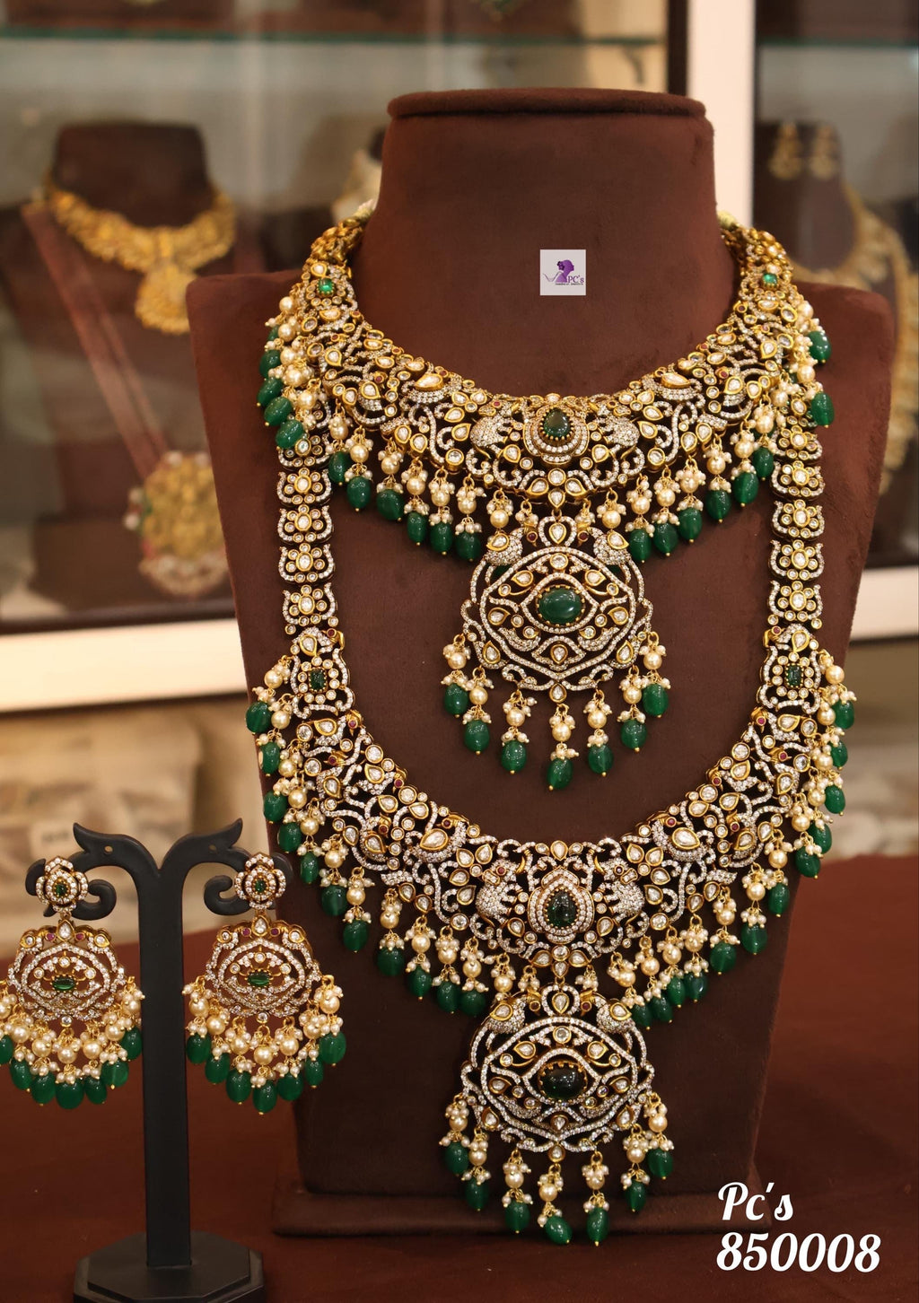 Stone studded Matt  finish  gold finish beautifully done wedding set ! Neck lace and long haram, and ear rings set