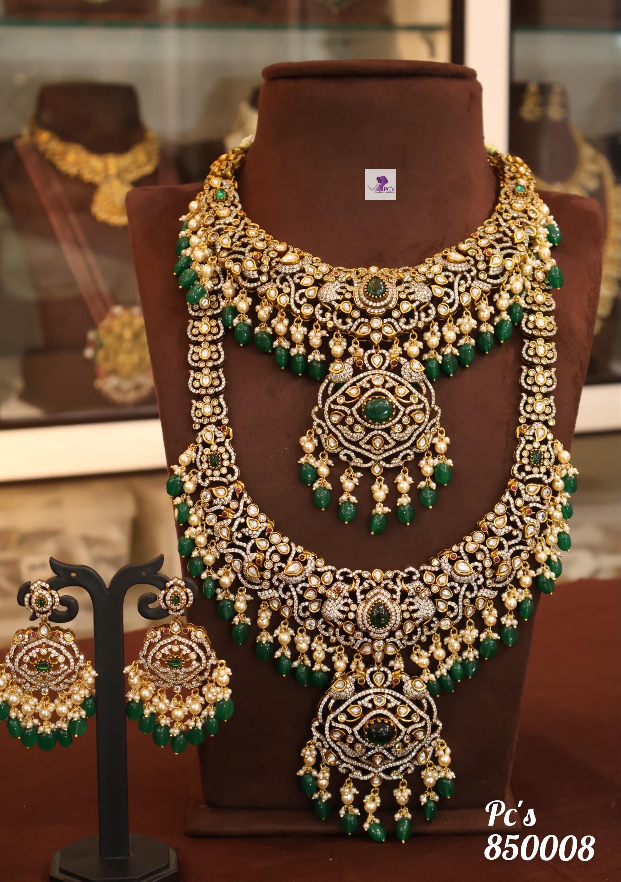 Stone studded Matt  finish  gold finish beautifully done wedding set ! Neck lace and long haram, and ear rings set