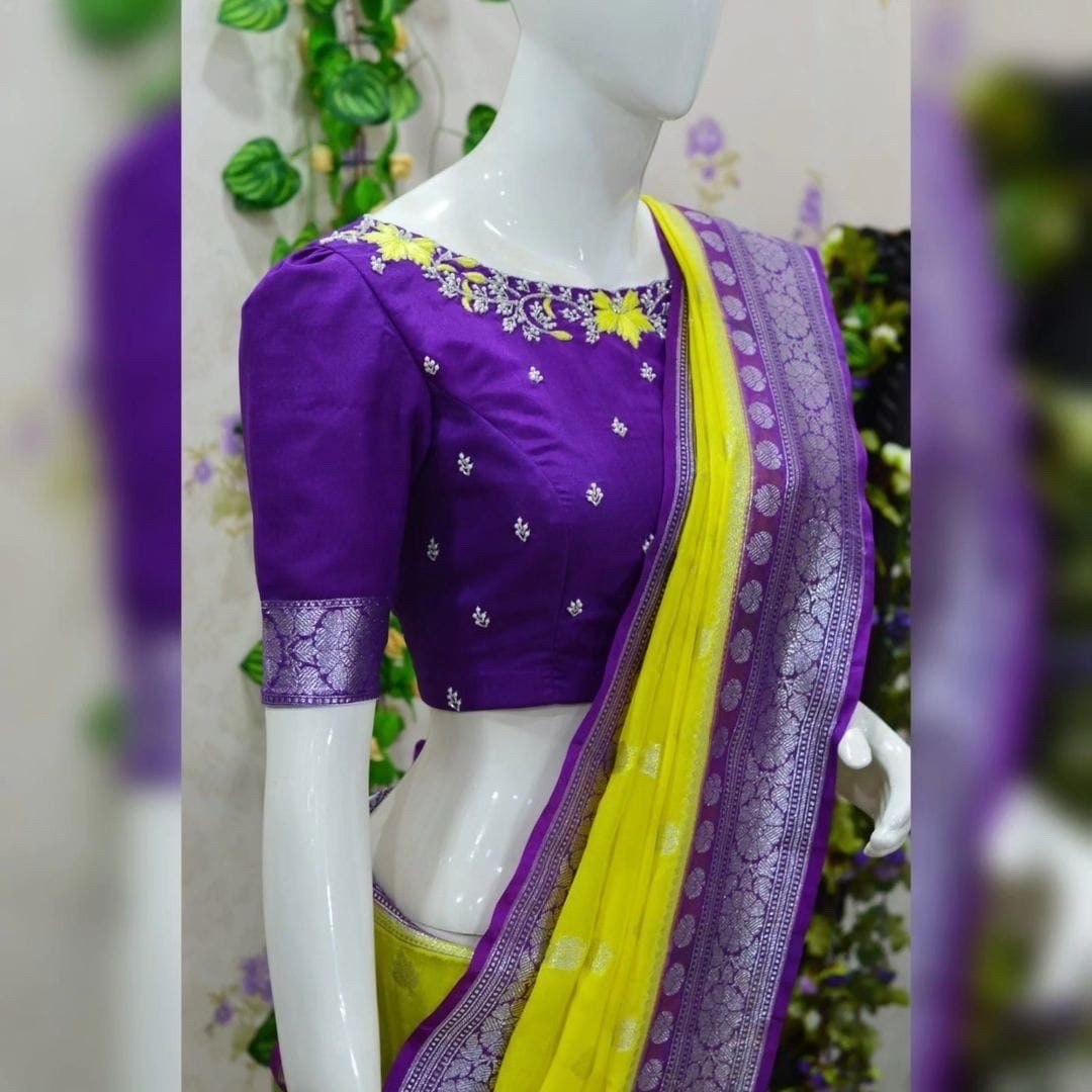 Beautiful banarasi saree paired up with pretty maggam work blouse.