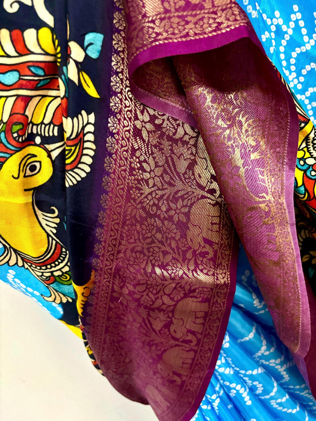 Beautiful pure silk bandini silk saree paired up pretty blouse sizes 32 -46 ready to wear.With Zari boarders elephant prints and peacocks
