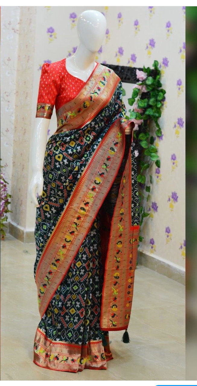 Beautiful patola paithani saree paired up with pretty banaras weaving blouse