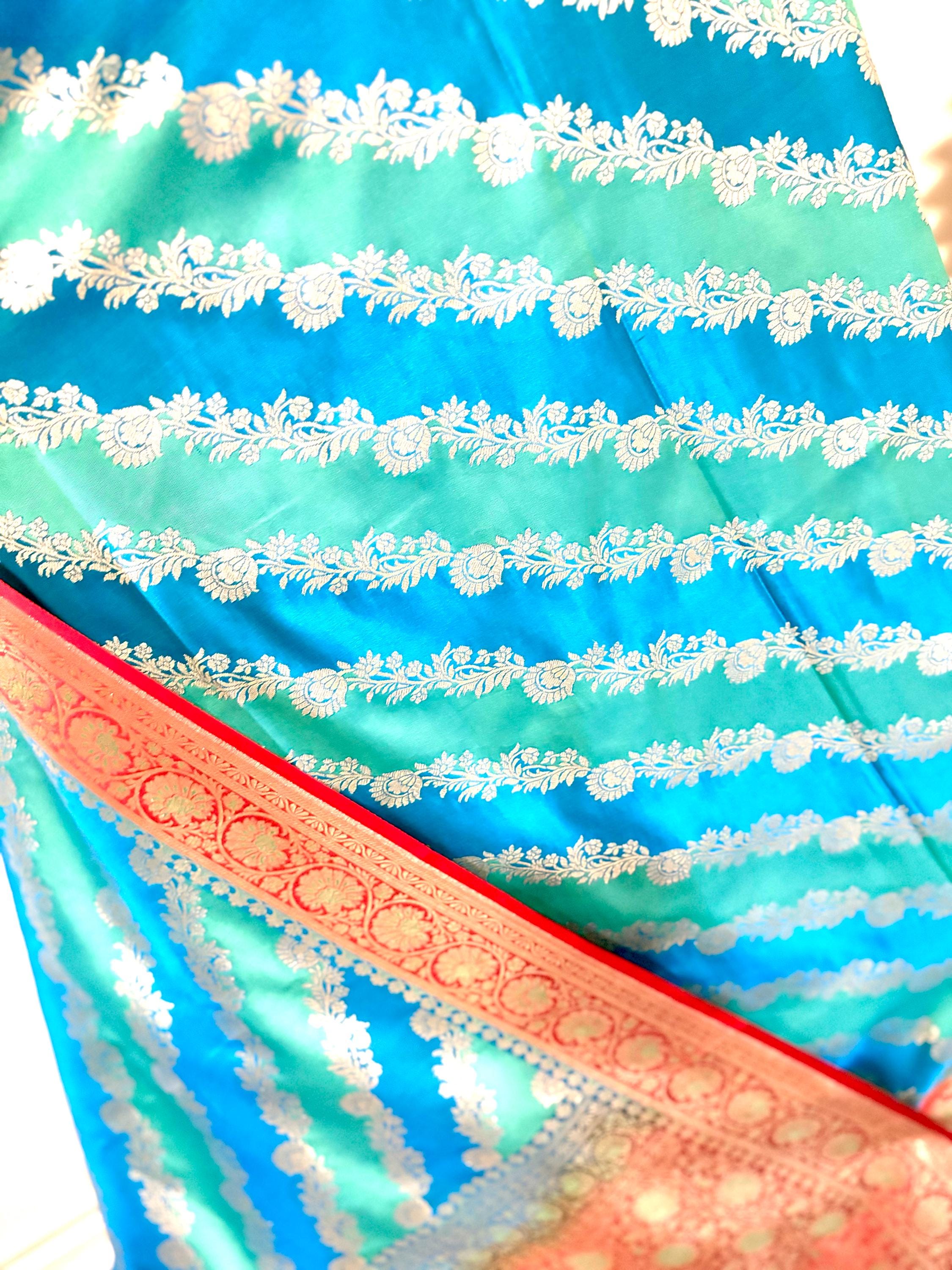 Pure silk  banarasi silk saree paired up with beautiful embroidery blouse fits to 32 to 46 in beautiful rare colors all over jaal. Cocktails