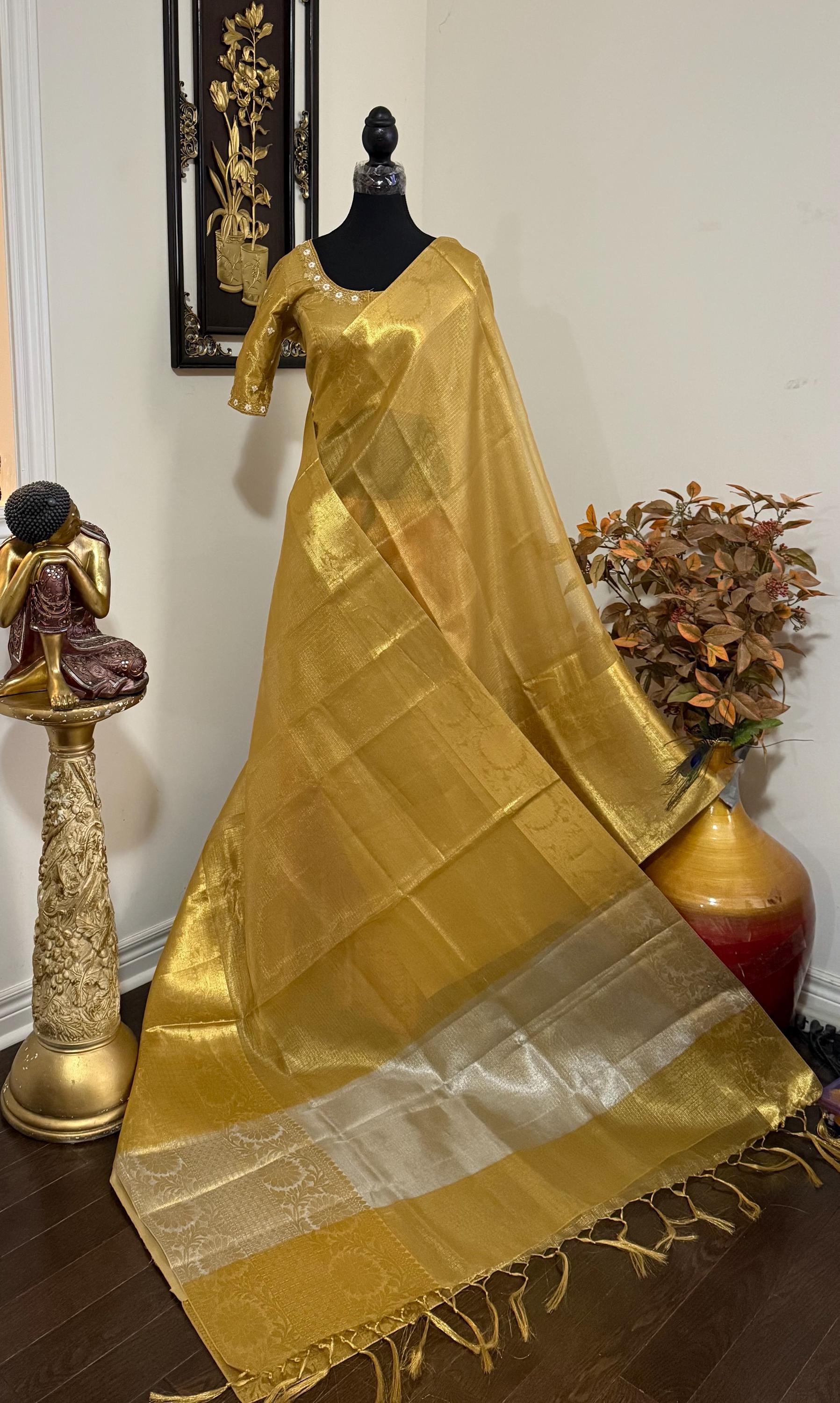 Banarasi double shades golden  tissue saree with self weaving stripes  on all over with beautifully done work blouse fits 32 to 46