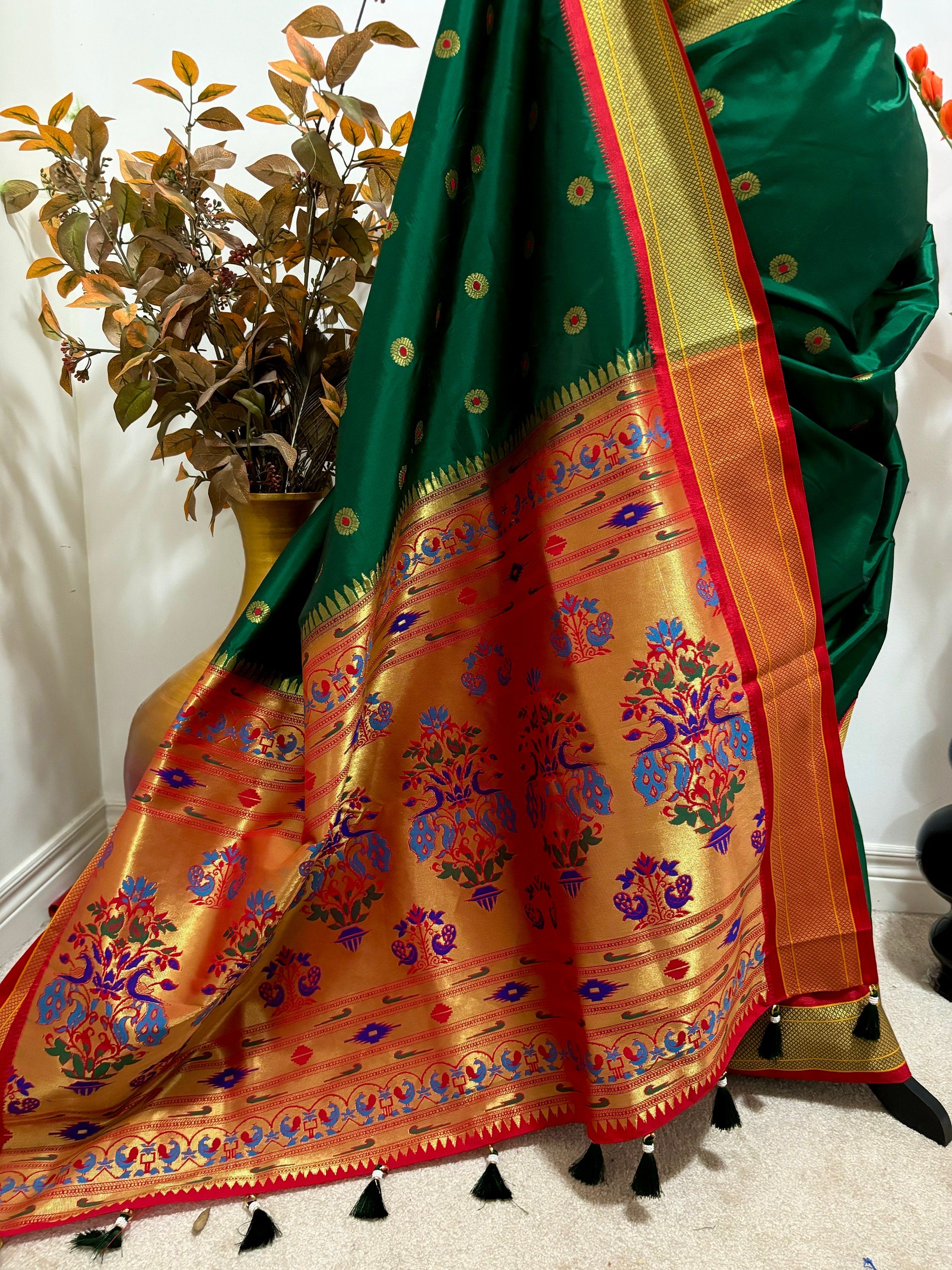 Beautiful pythani pure silk saree with   ready to wear beautiful  work blouse fits up to 32 to 46 Bottle green color, saree is ready to wear
