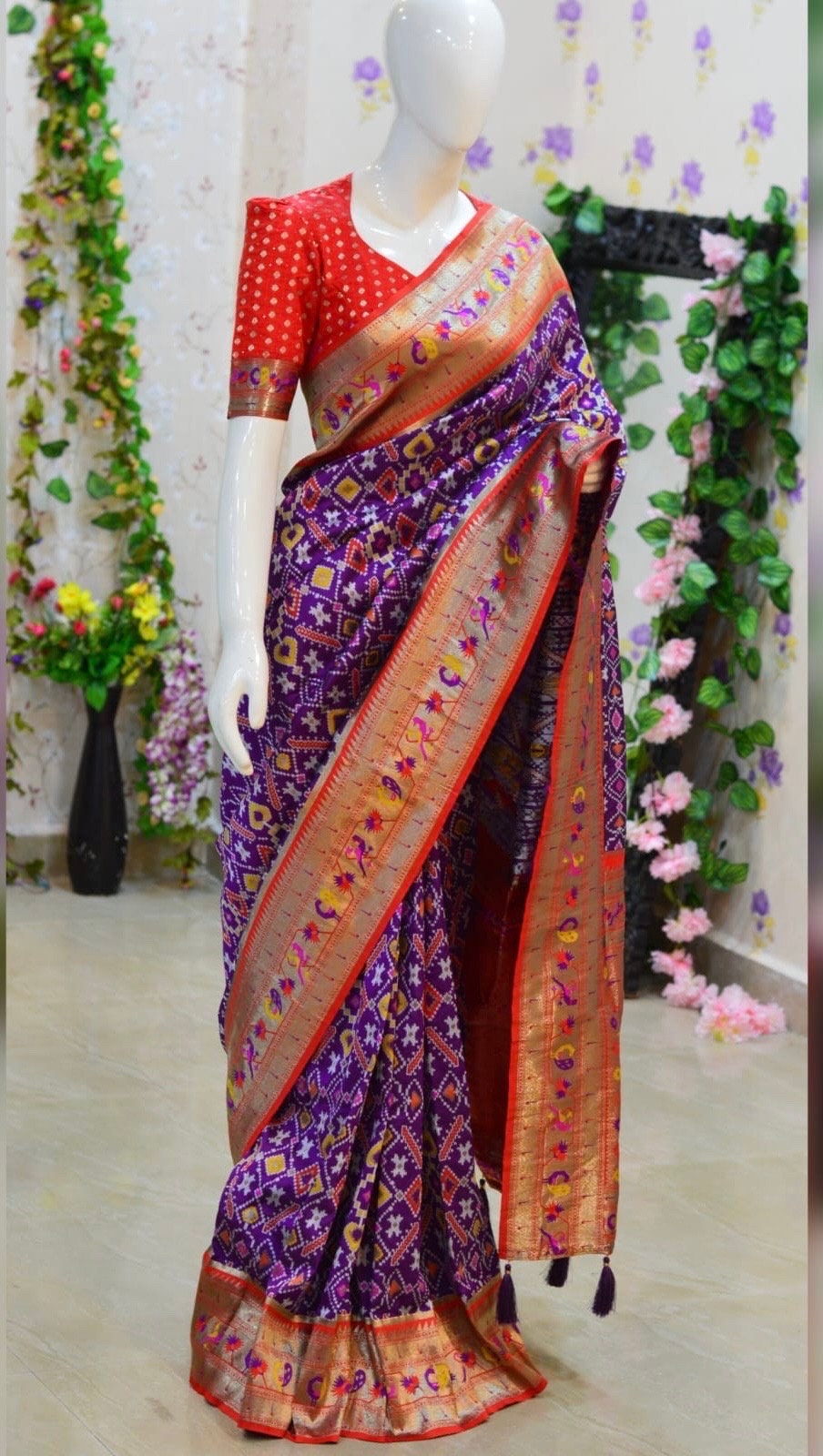 Beautiful patola paithani saree paired up with pretty banaras weaving blouse