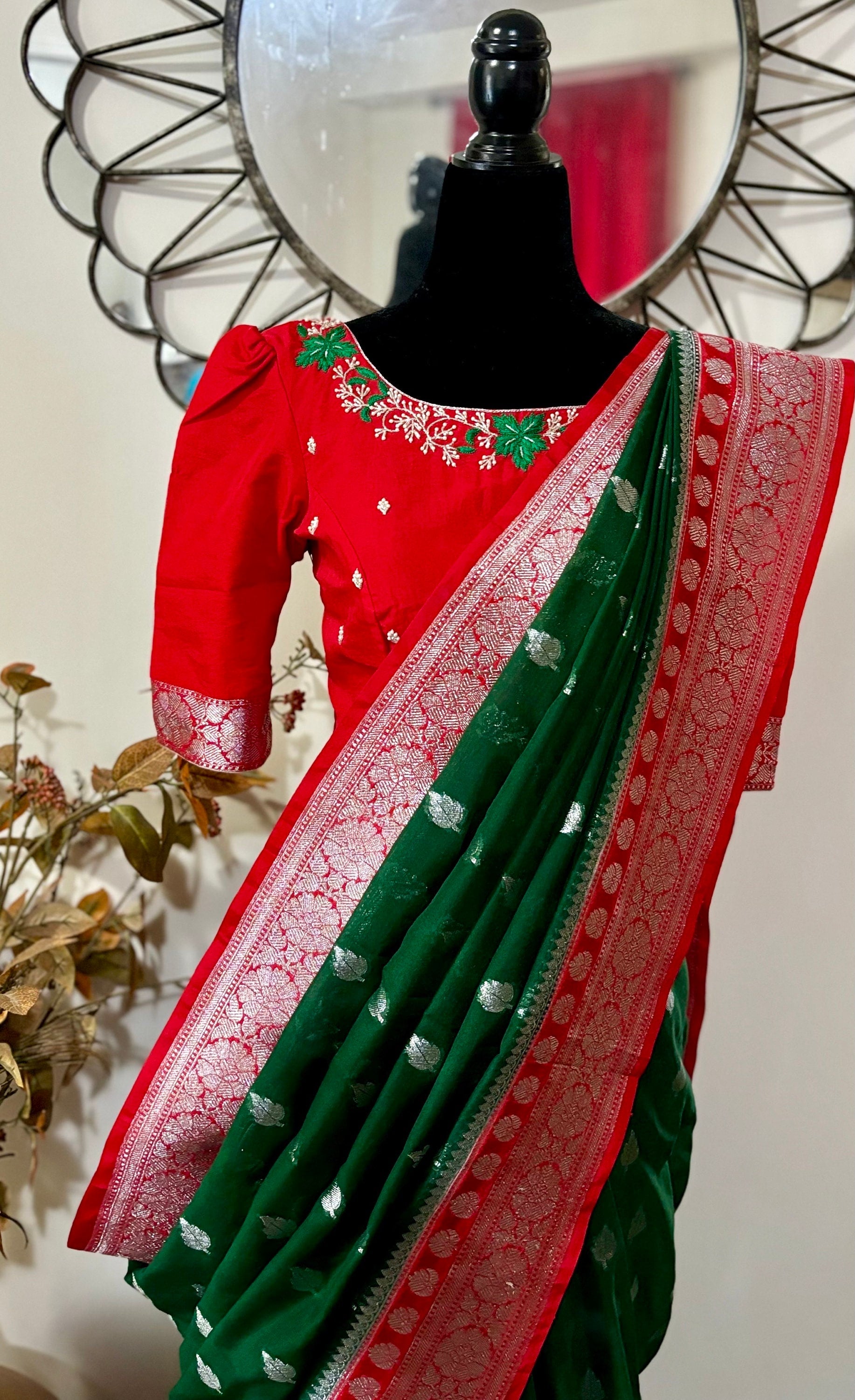 Beautiful banarasi kattan saree paired up with pretty maggam work blouse.