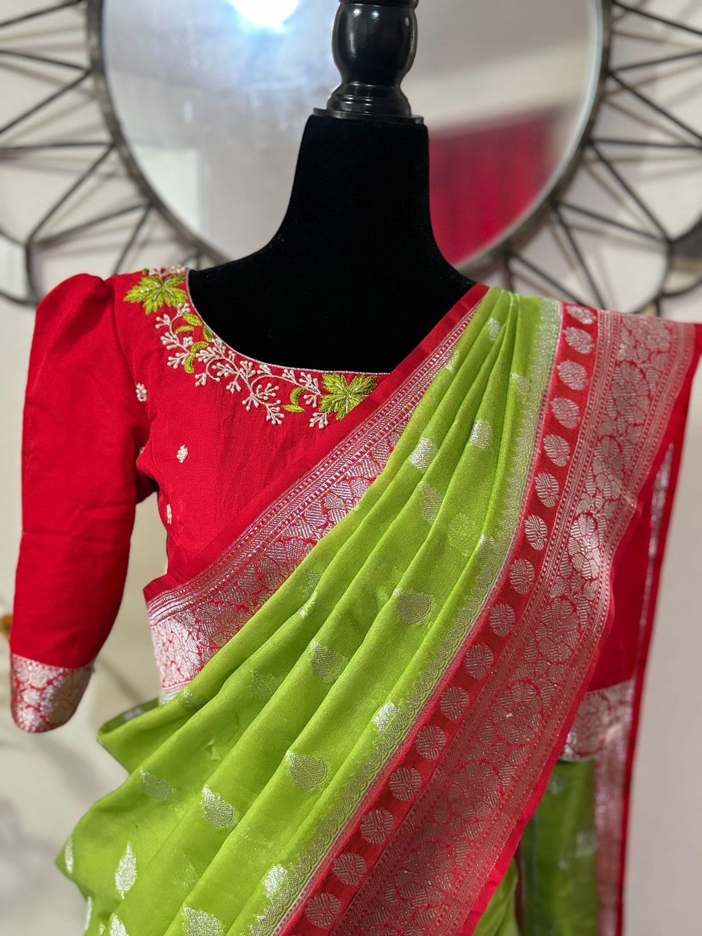 Beautiful banarasi saree paired up with pretty maggam work blouse.