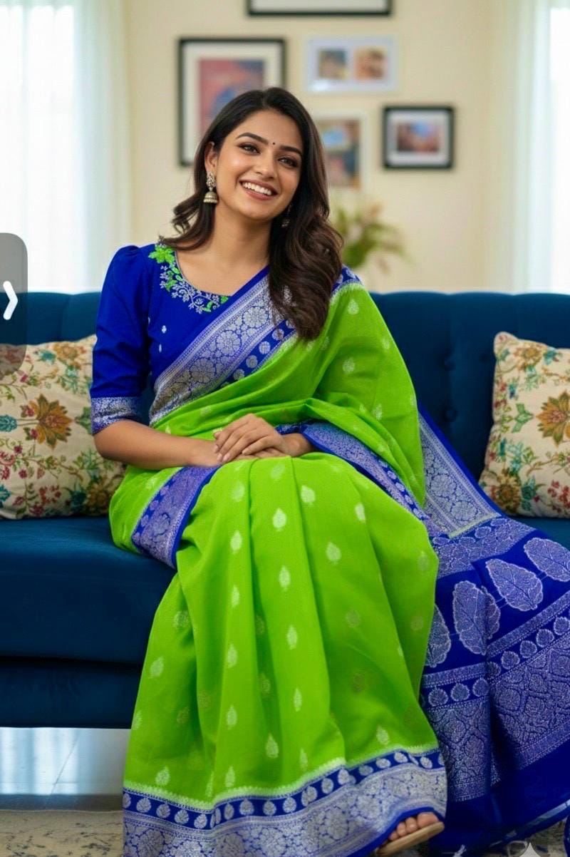 Beautiful banarasi kattan saree paired up with pretty maggam work blouse.
