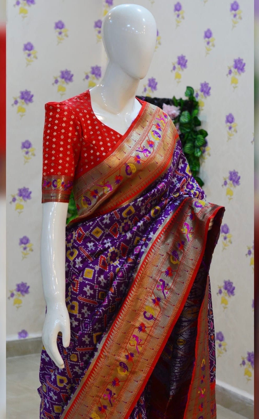 Beautiful patola paithani saree paired up with pretty banaras weaving blouse