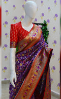 Beautiful patola paithani saree paired up with pretty banaras weaving blouse