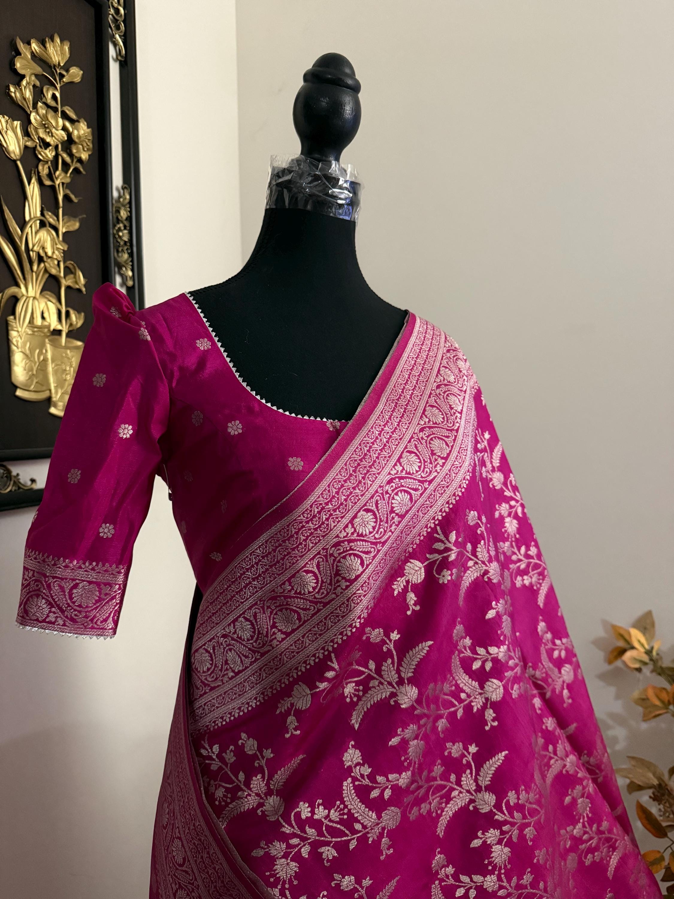 Beautiful banarasi saree with silver Zari weaving all over the saree paired up with pretty ready to wear  blouse that fits to 32 to 46