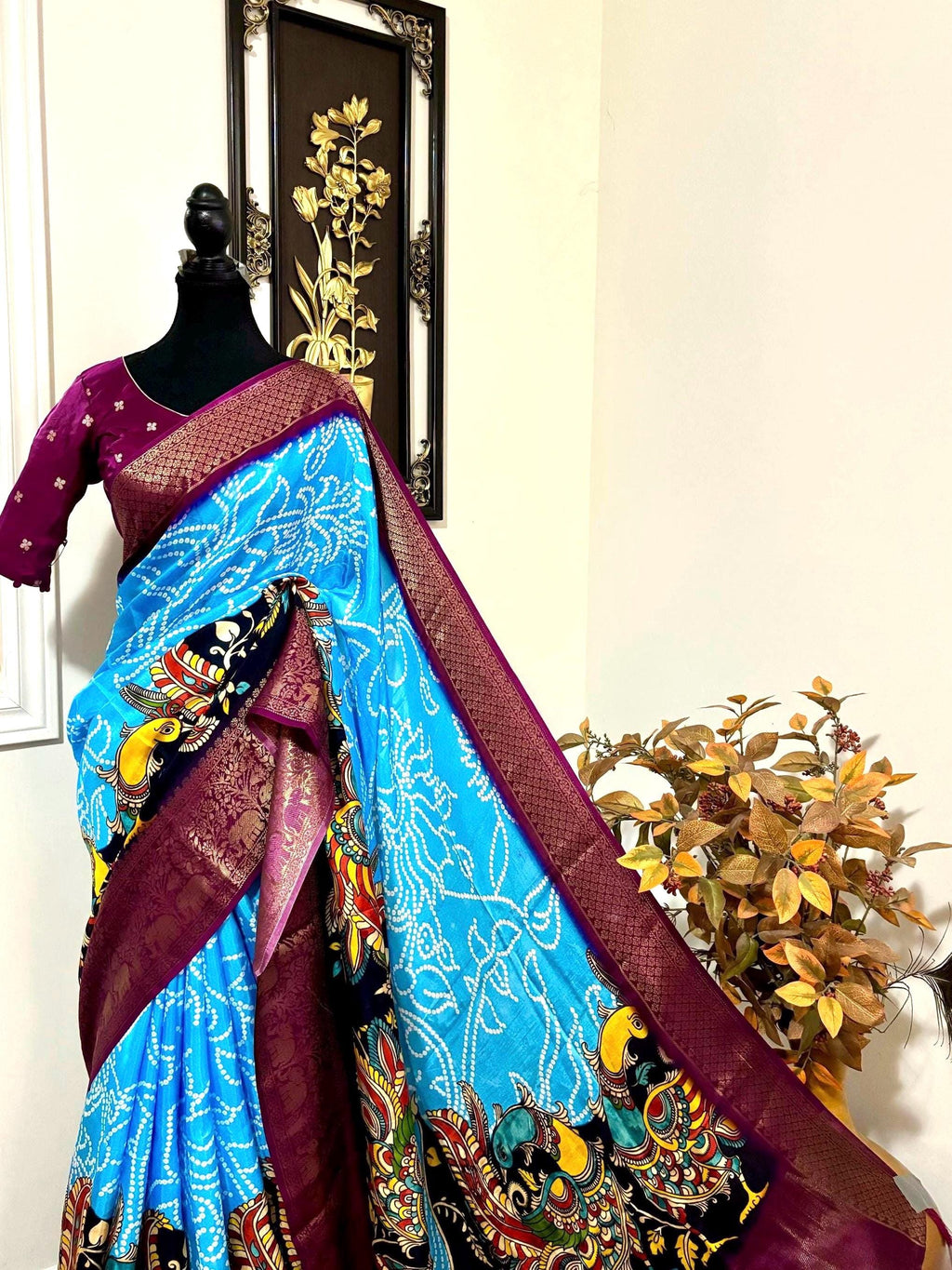 Beautiful pure silk bandini silk saree paired up pretty blouse sizes 32 -46 ready to wear.With Zari boarders elephant prints and peacocks