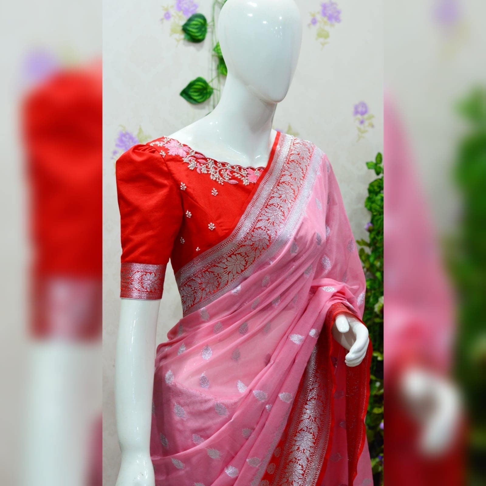 Beautiful banarasi saree paired up with pretty maggam work blouse.