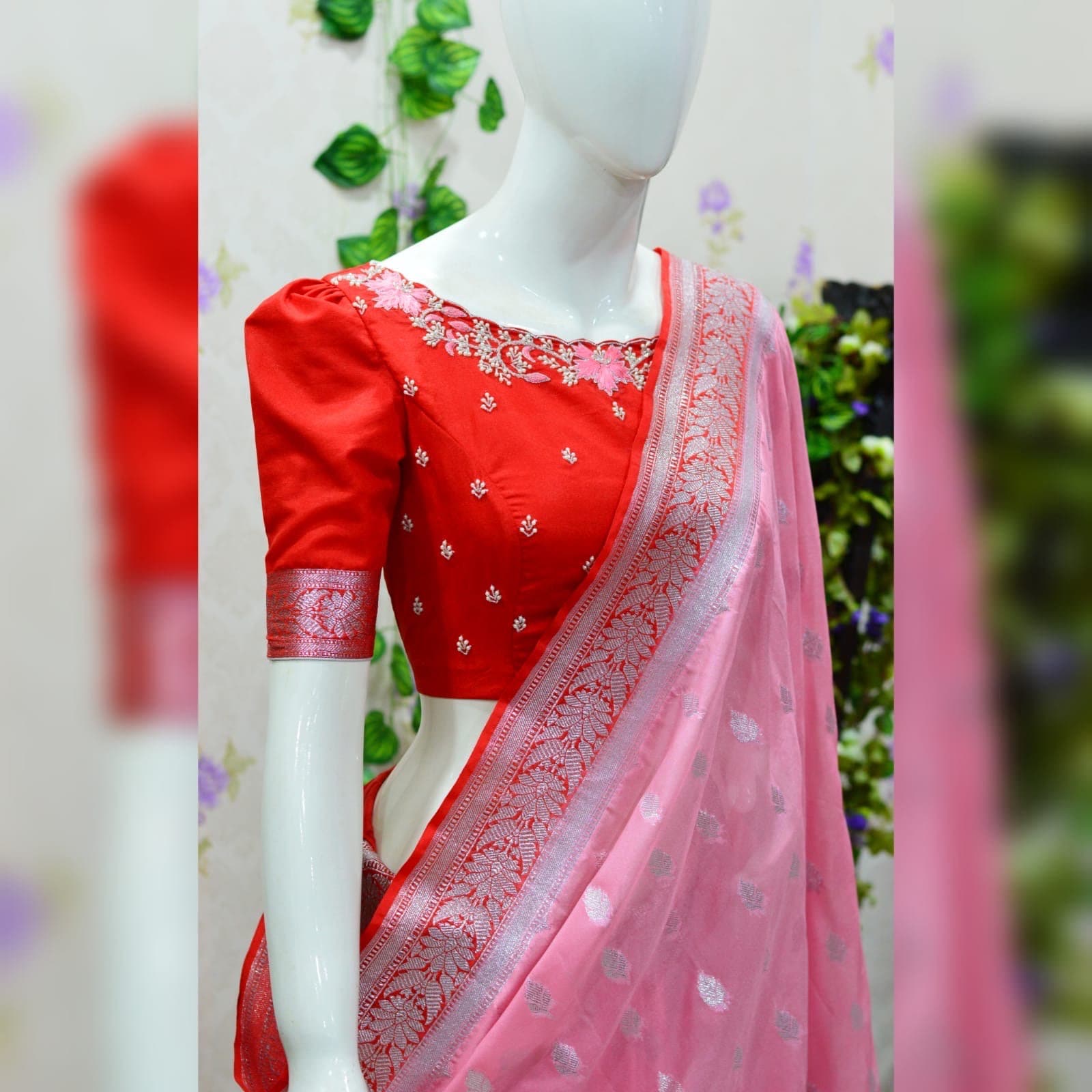 Beautiful banarasi saree paired up with pretty maggam work blouse.