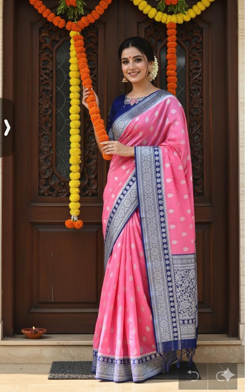 Beautiful banarasi kattan saree paired up with pretty maggam work blouse.