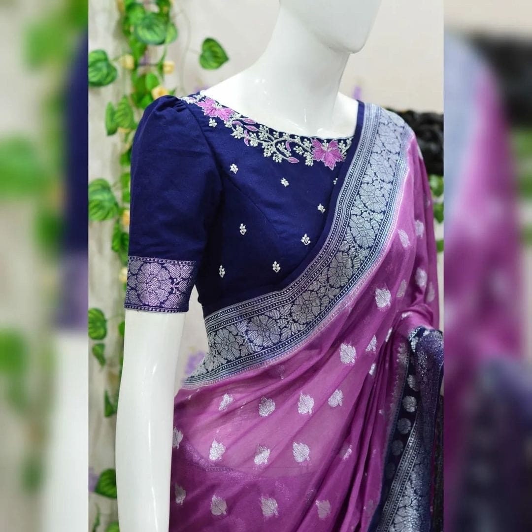 Beautiful banarasi kattan saree paired up with pretty maggam work blouse.
