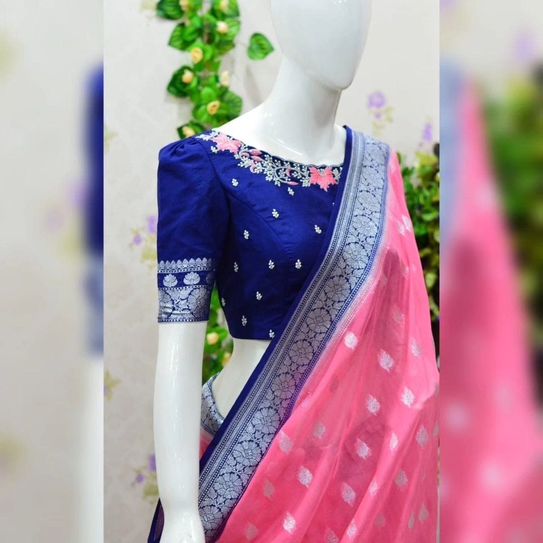 Beautiful banarasi kattan saree paired up with pretty maggam work blouse.