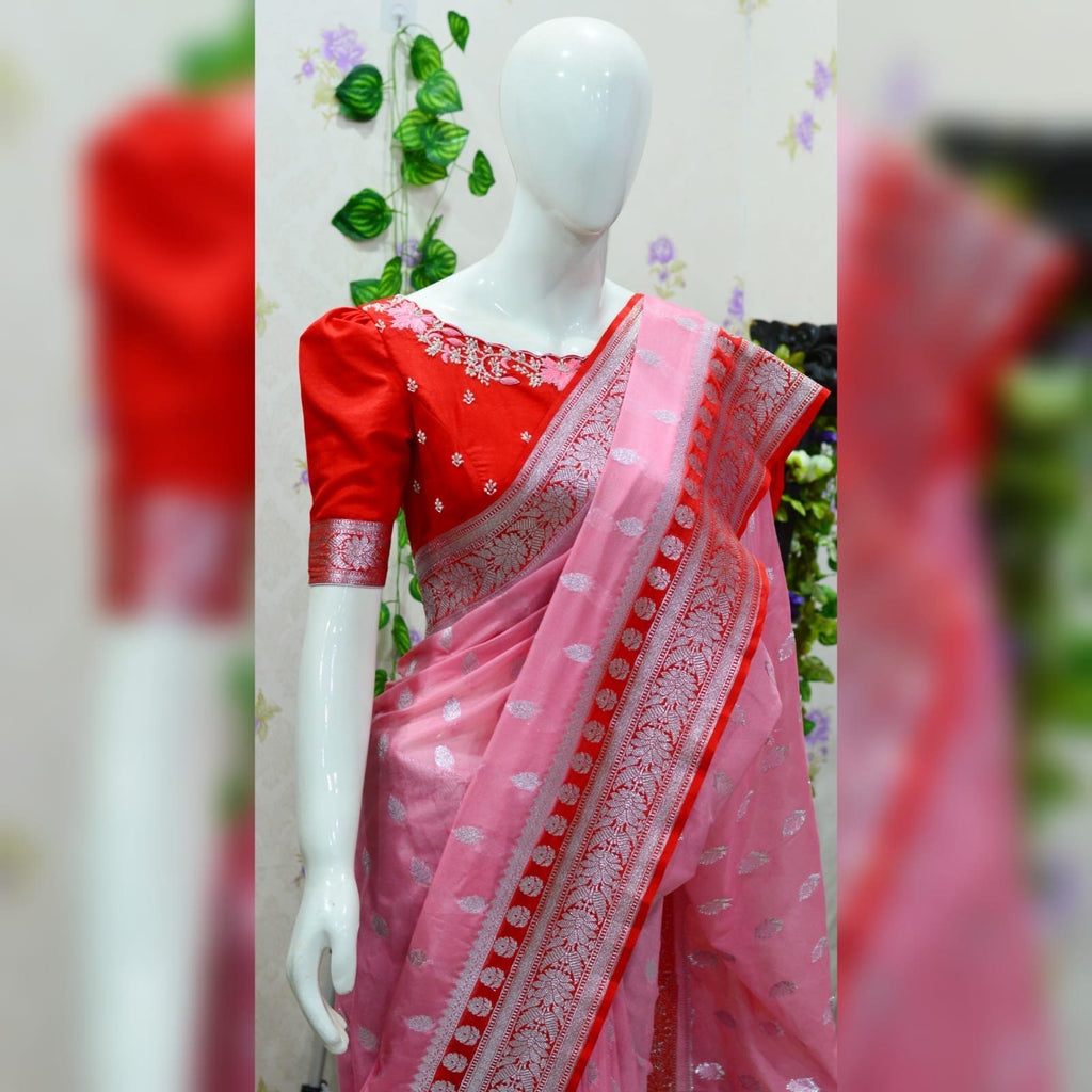 Beautiful banarasi saree paired up with pretty maggam work blouse.