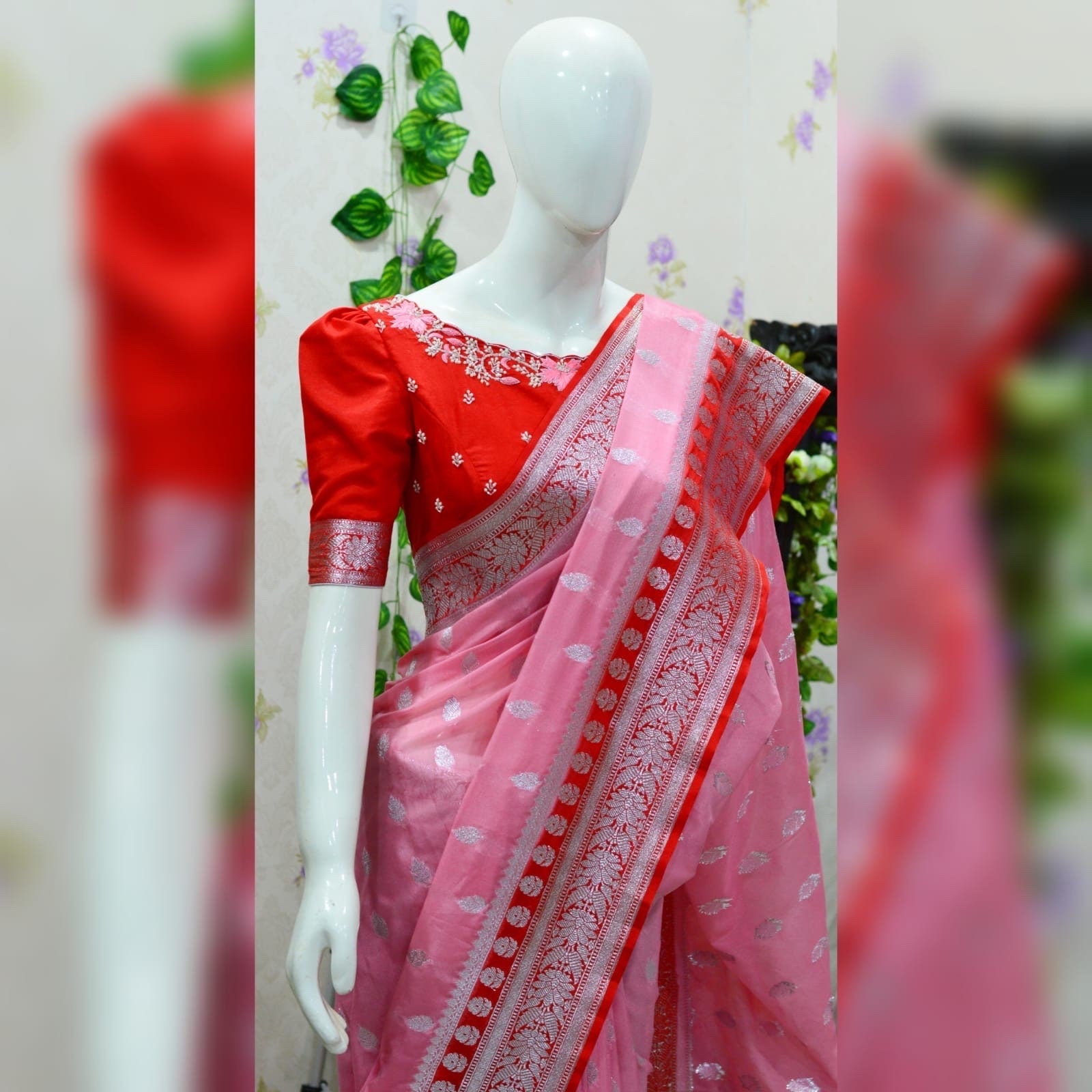 Beautiful banarasi saree paired up with pretty maggam work blouse.