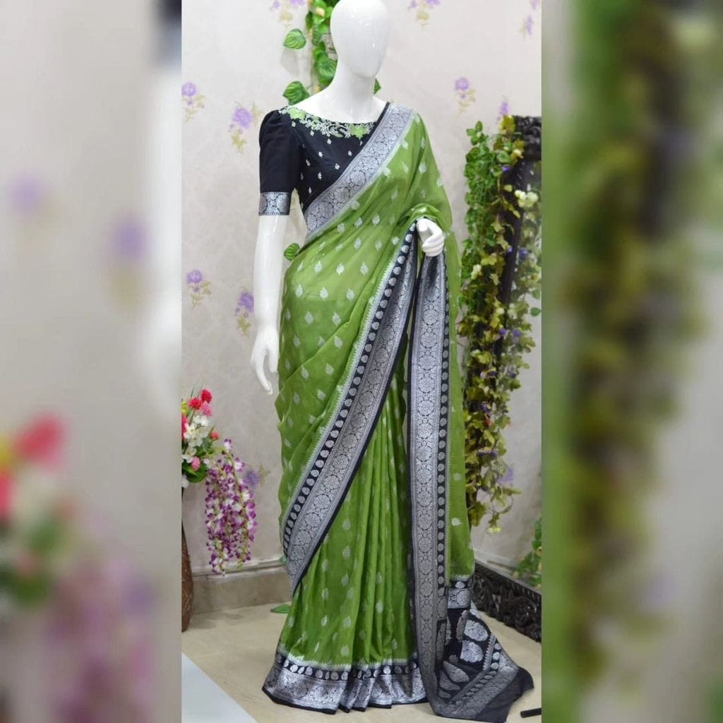 Beautiful banarasi kattan saree paired up with pretty maggam work blouse.