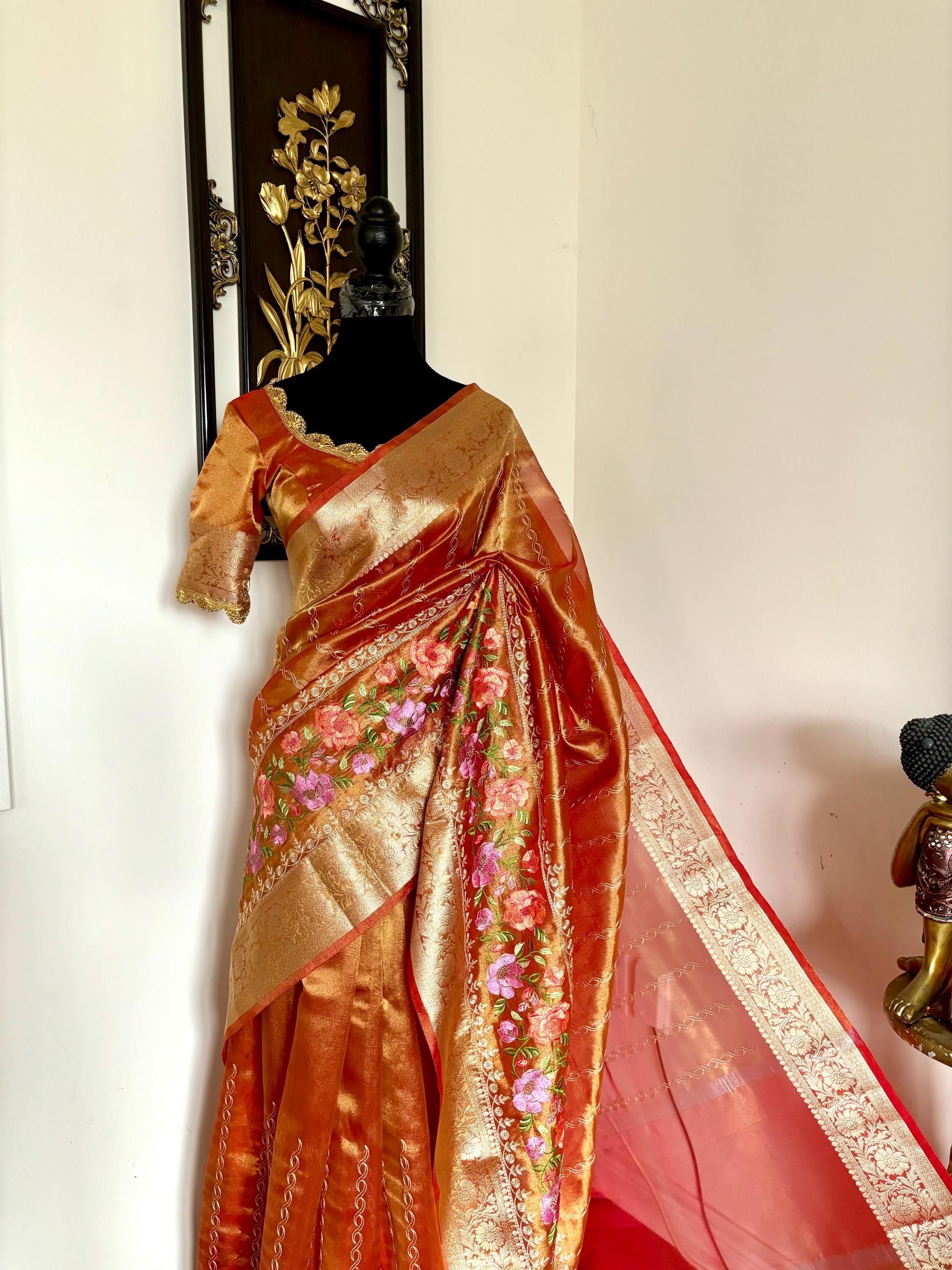 Banarasi  tissue saree with self weaving with beautifully embroidered boarder all over the sareeOrange Gold  shade rich weaving ready Blouse
