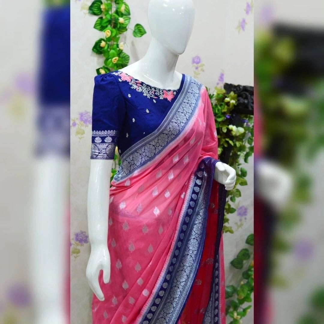 Beautiful banarasi kattan saree paired up with pretty maggam work blouse.