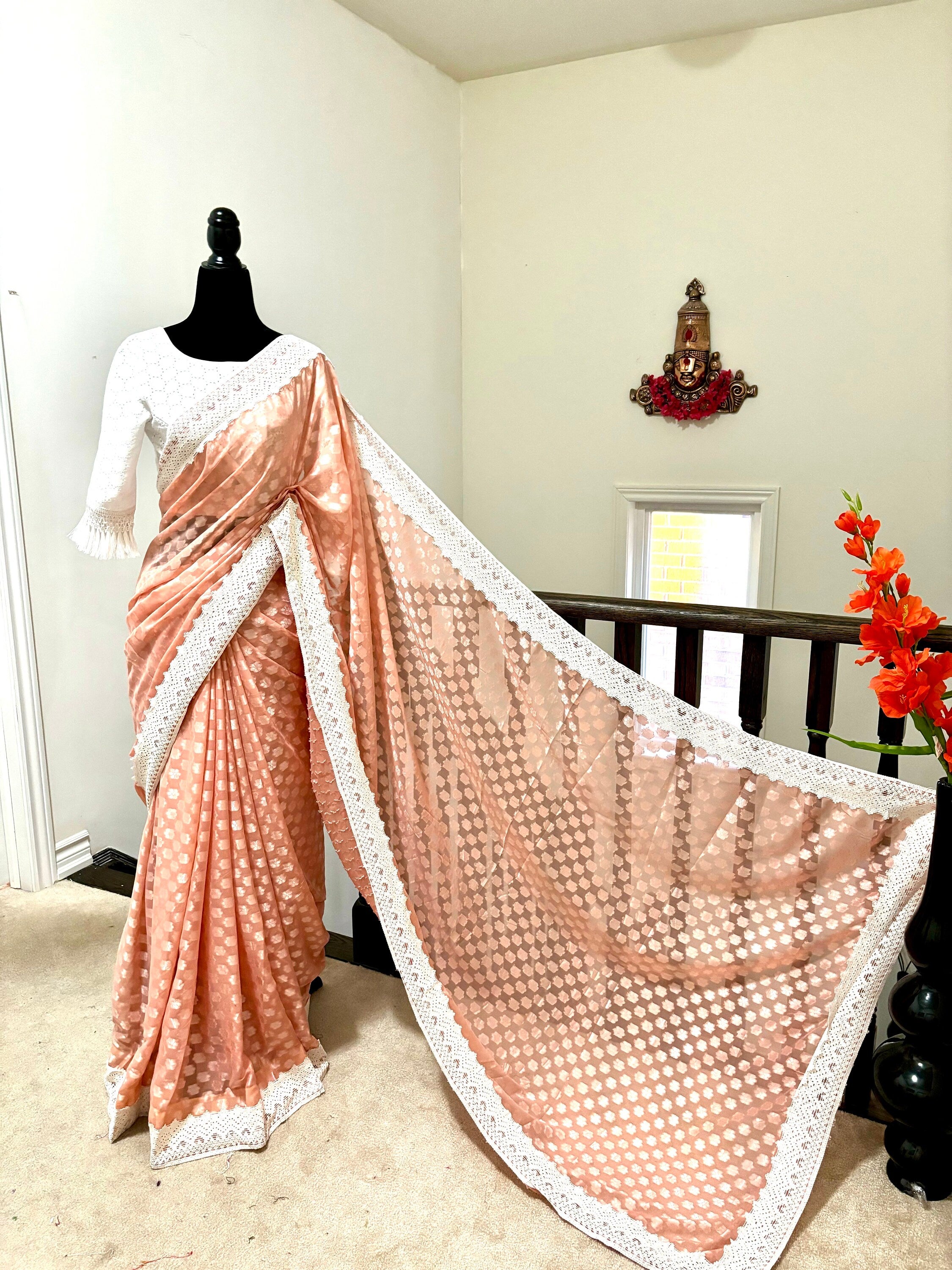 Beautiful soft falling  georgette on  sabyasachi  lace borders unique eye  cooling pestal shades. Ready to wear designer blouse fits 32-44
