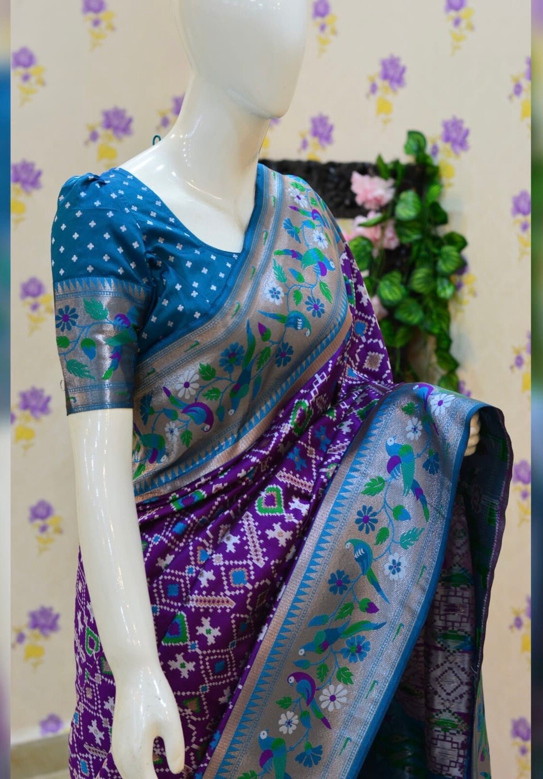 Beautiful patola paithani saree paired up with pretty banaras weaving blouse