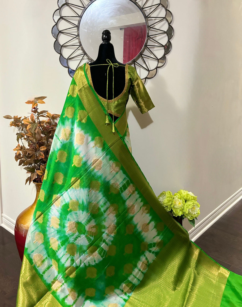 Banarasi kora organza saree with beautiful tie and dye all over the saree. Saree is ready with beautiful designer blouse that fit to 32-46
