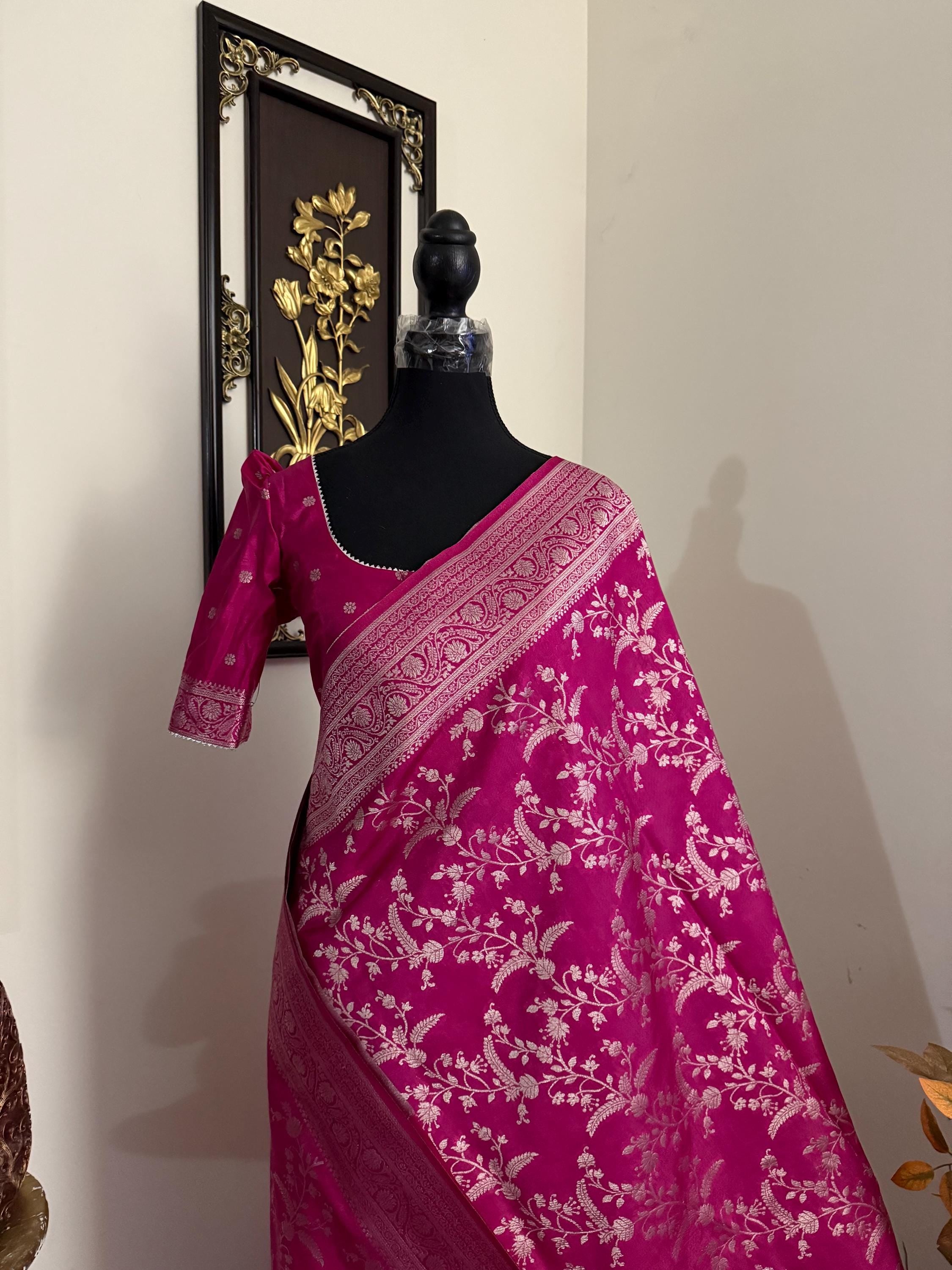 Beautiful banarasi saree with silver Zari weaving all over the saree paired up with pretty ready to wear  blouse that fits to 32 to 46