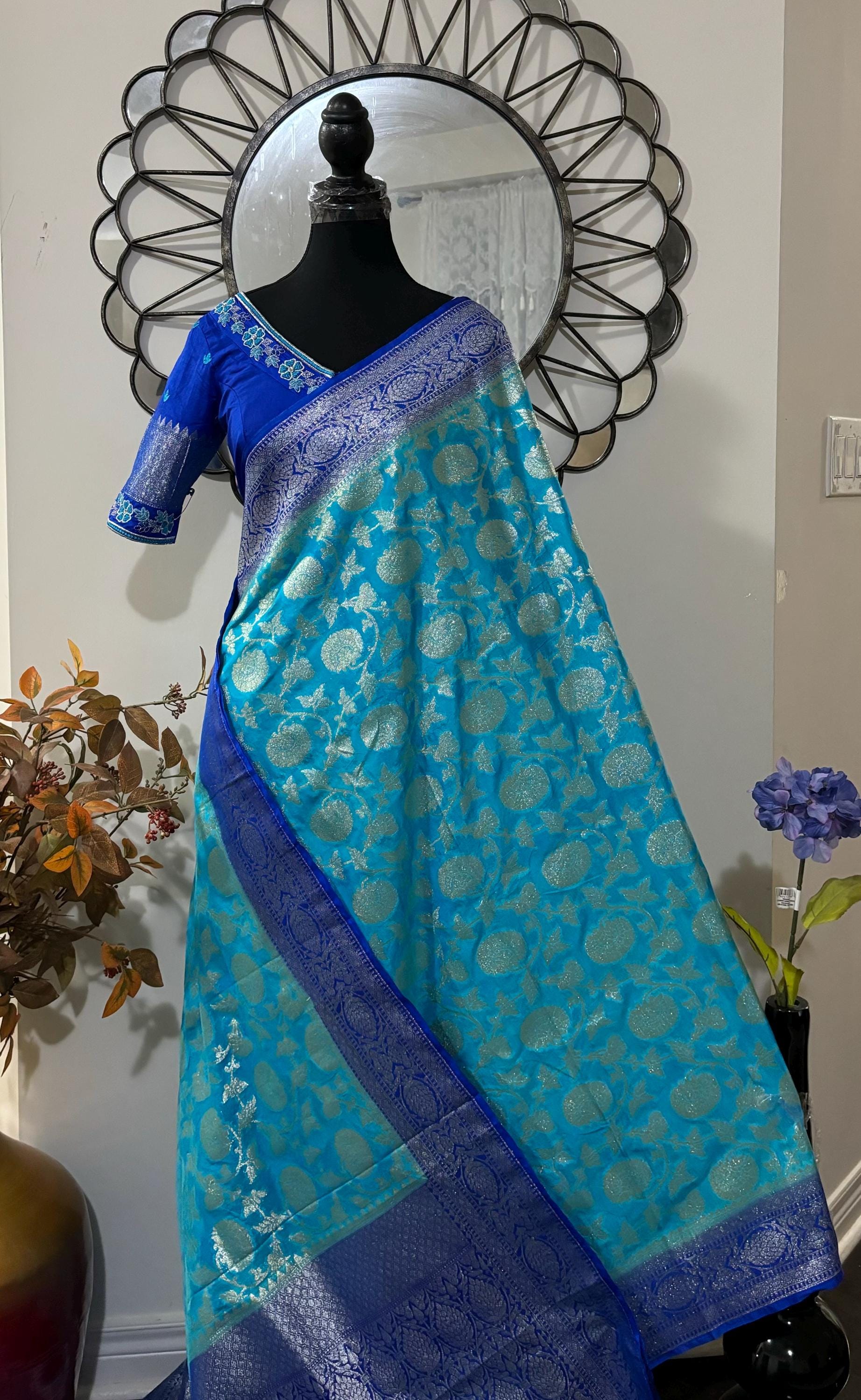 Beautiful banarasi silk saree paired up with beautiful embroidery blouse fits to 32 to 46 in beautiful rare colors all over jaal. Cocktails