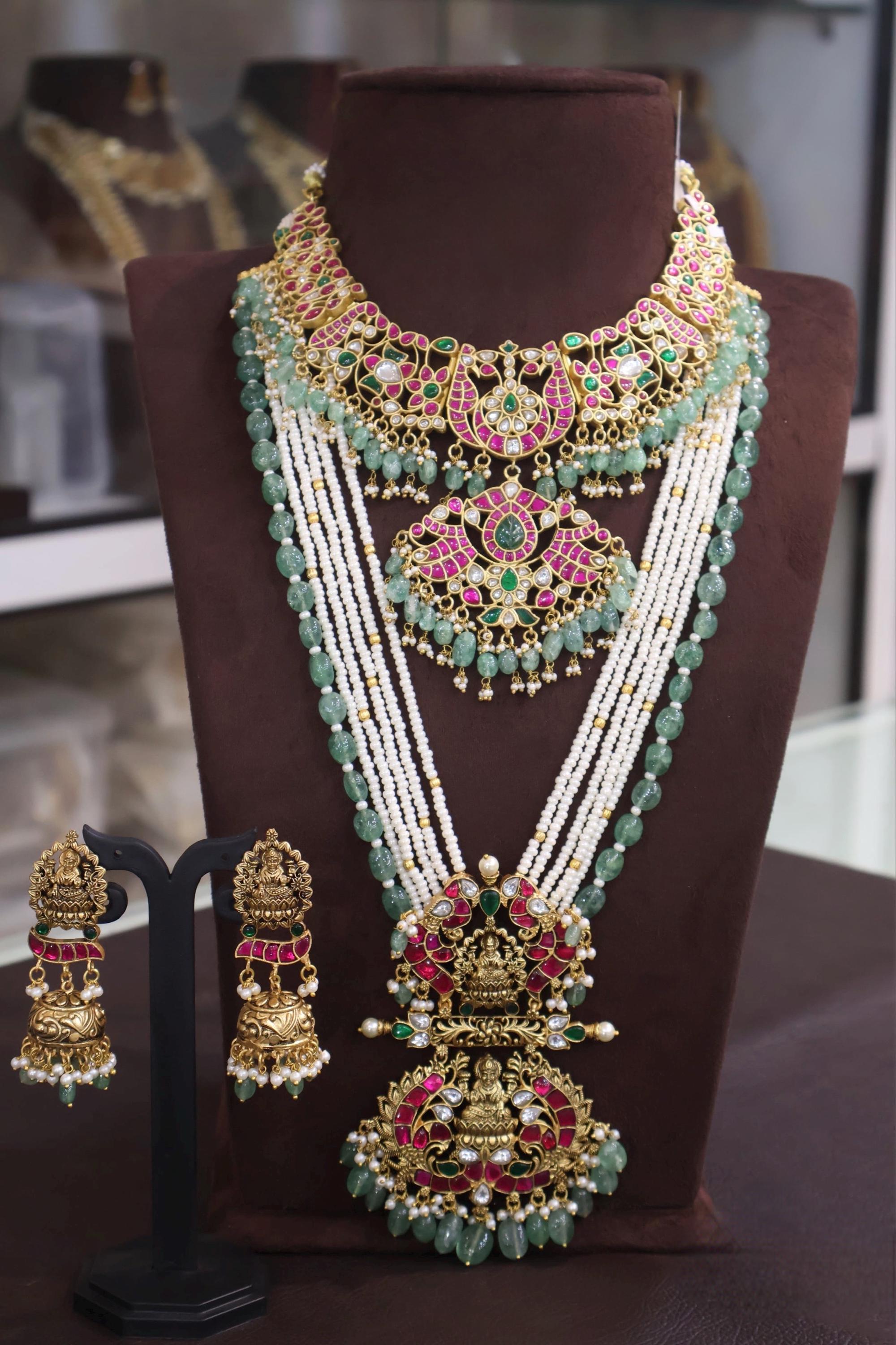 Party and wedding wear Anteque gold  finish one gram gold bridal set with precious pearls , emaralds beads and Kempu stones