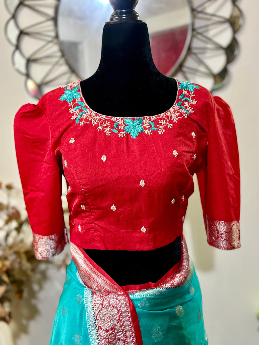 Beautiful banarasi saree paired up with pretty maggam work blouse.